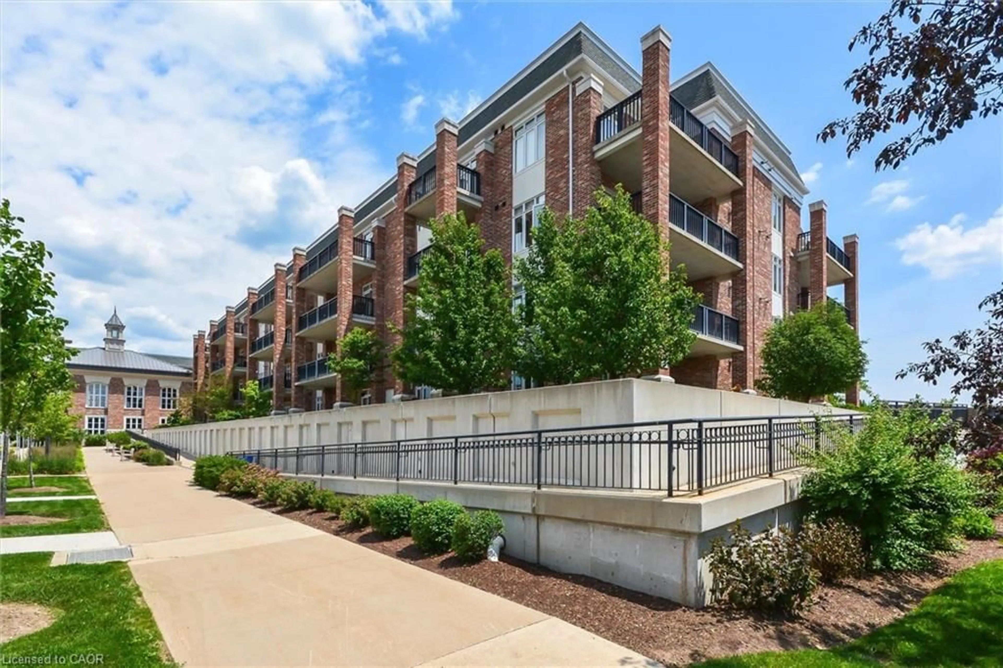 Patio, street for 65 Bayberry Dr #404, Guelph Ontario N1G 5K8