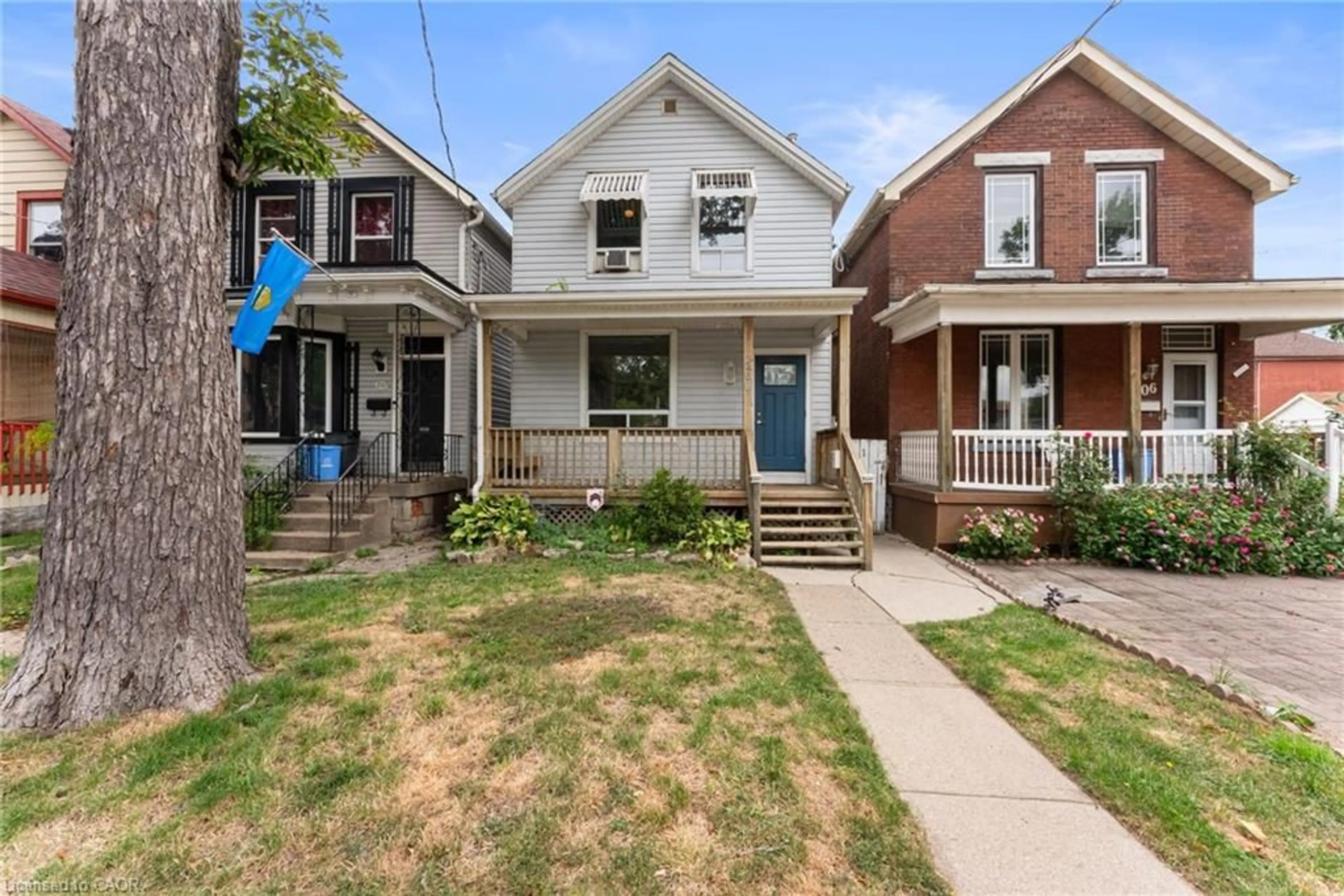 Home with brick exterior material, street for 208 East Ave, Hamilton Ontario L8L 5J3