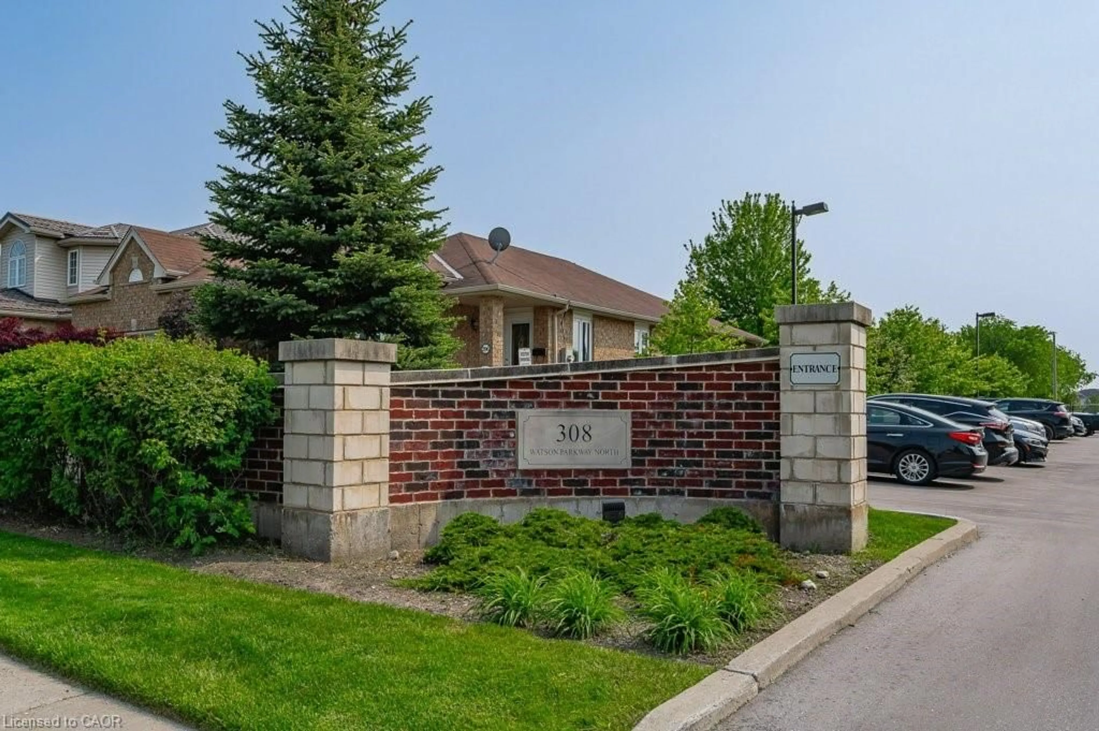 Home with brick exterior material, street for 308 Watson Pky #315, Guelph Ontario N1E 0G7