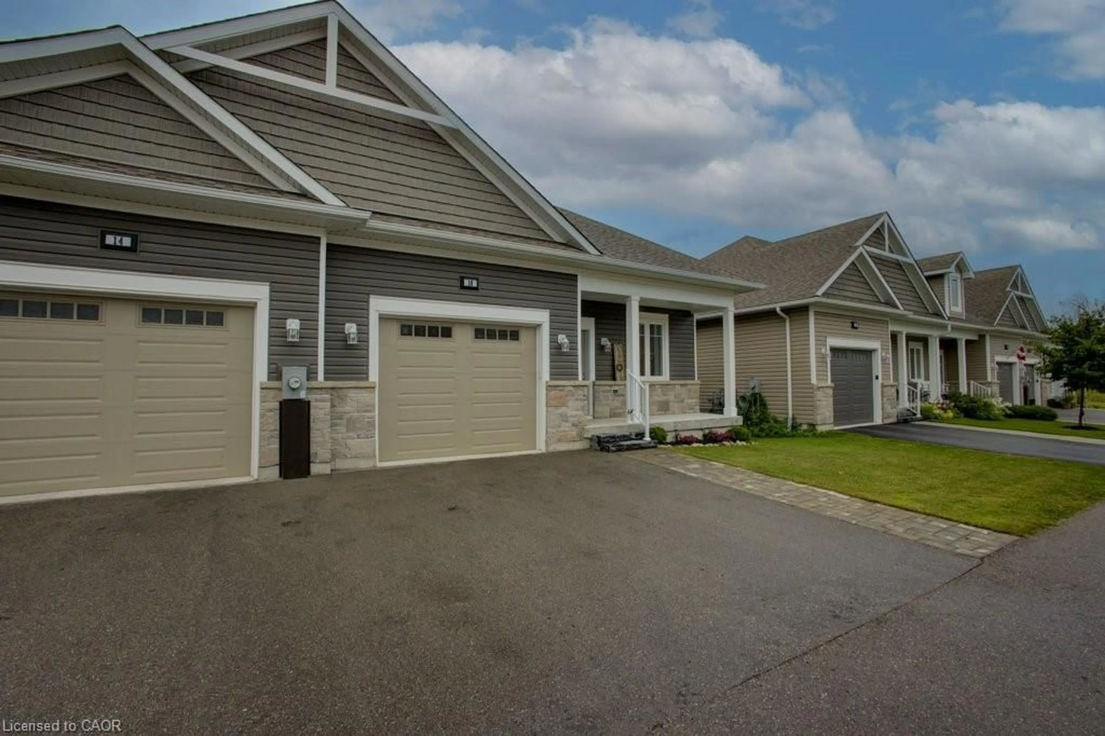 Home with vinyl exterior material, street for 24 George St #16, Harriston Ontario N0G 1Z0