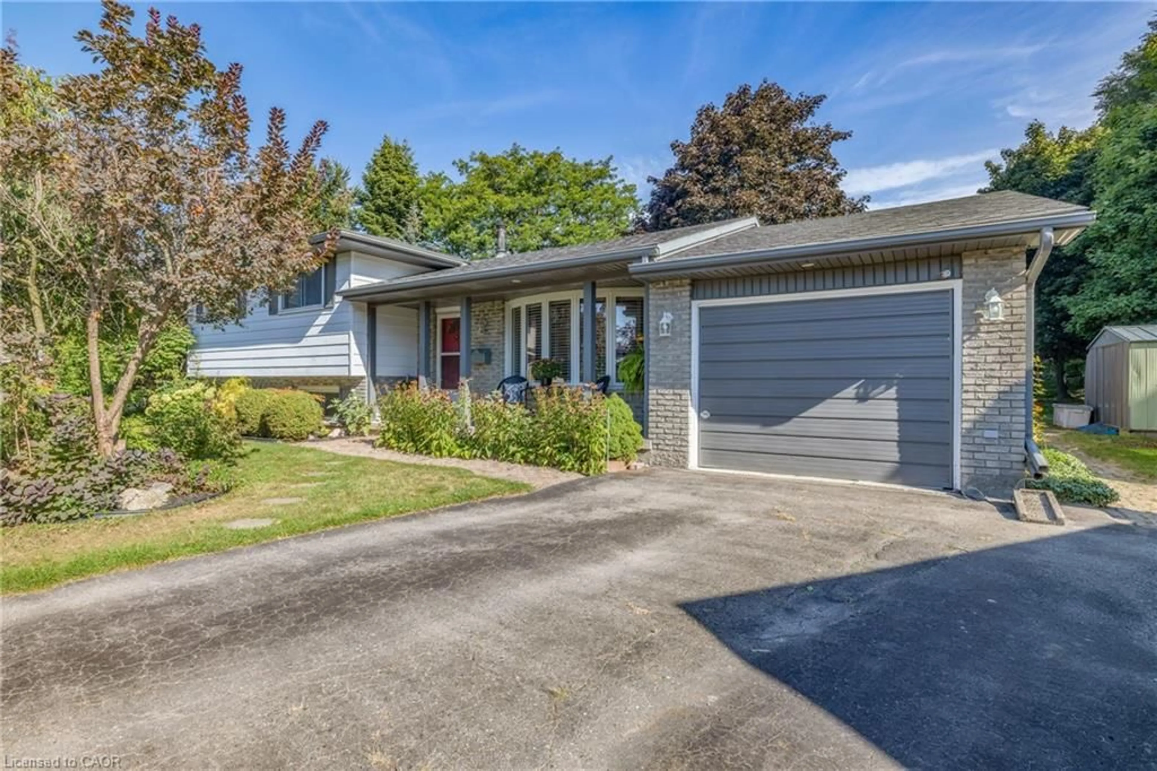 Home with vinyl exterior material, street for 34 Peers Pl, Woodstock Ontario N4S 8G8