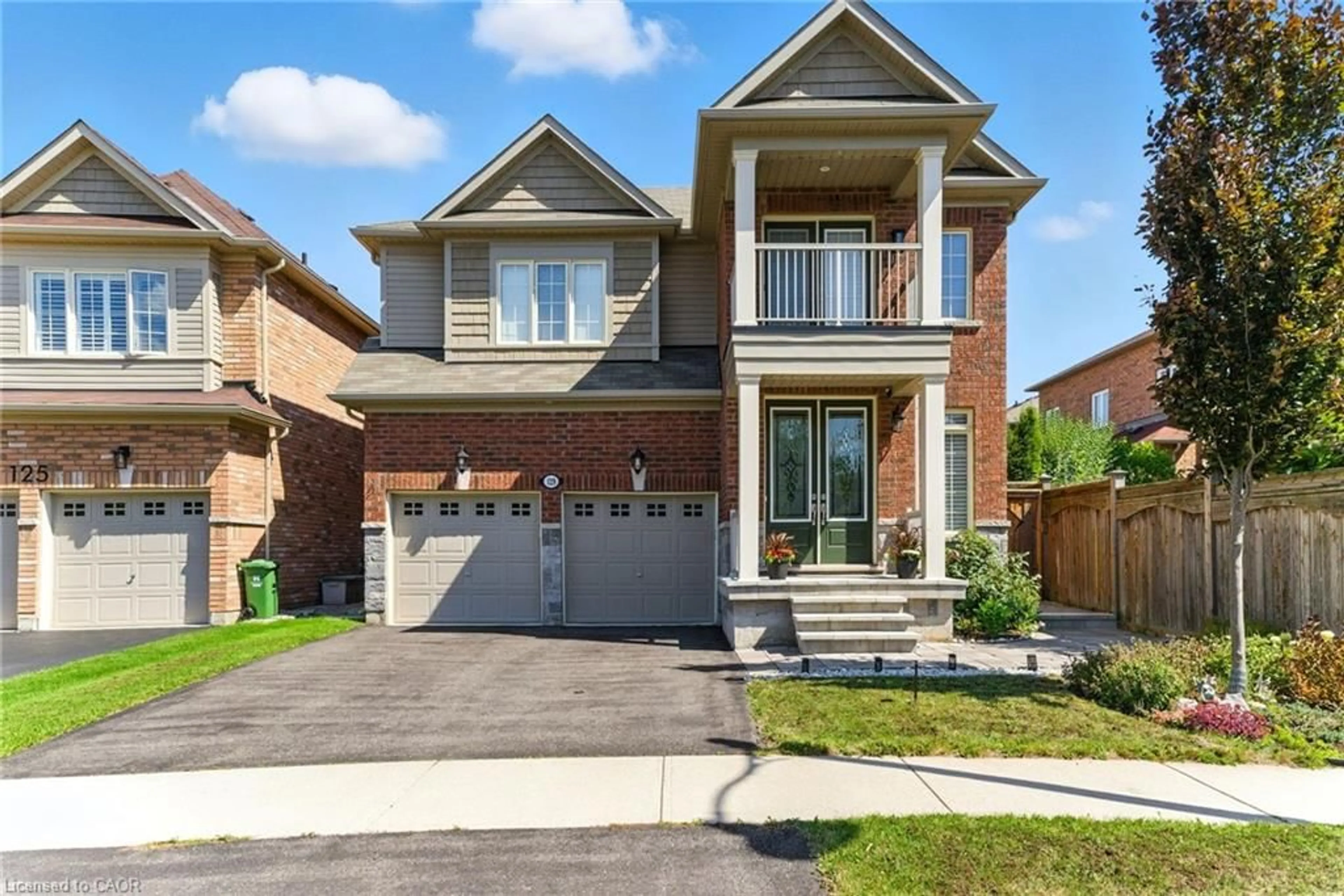 Home with brick exterior material, street for 129 Fingland Cres, Waterdown Ontario L8B 0S7