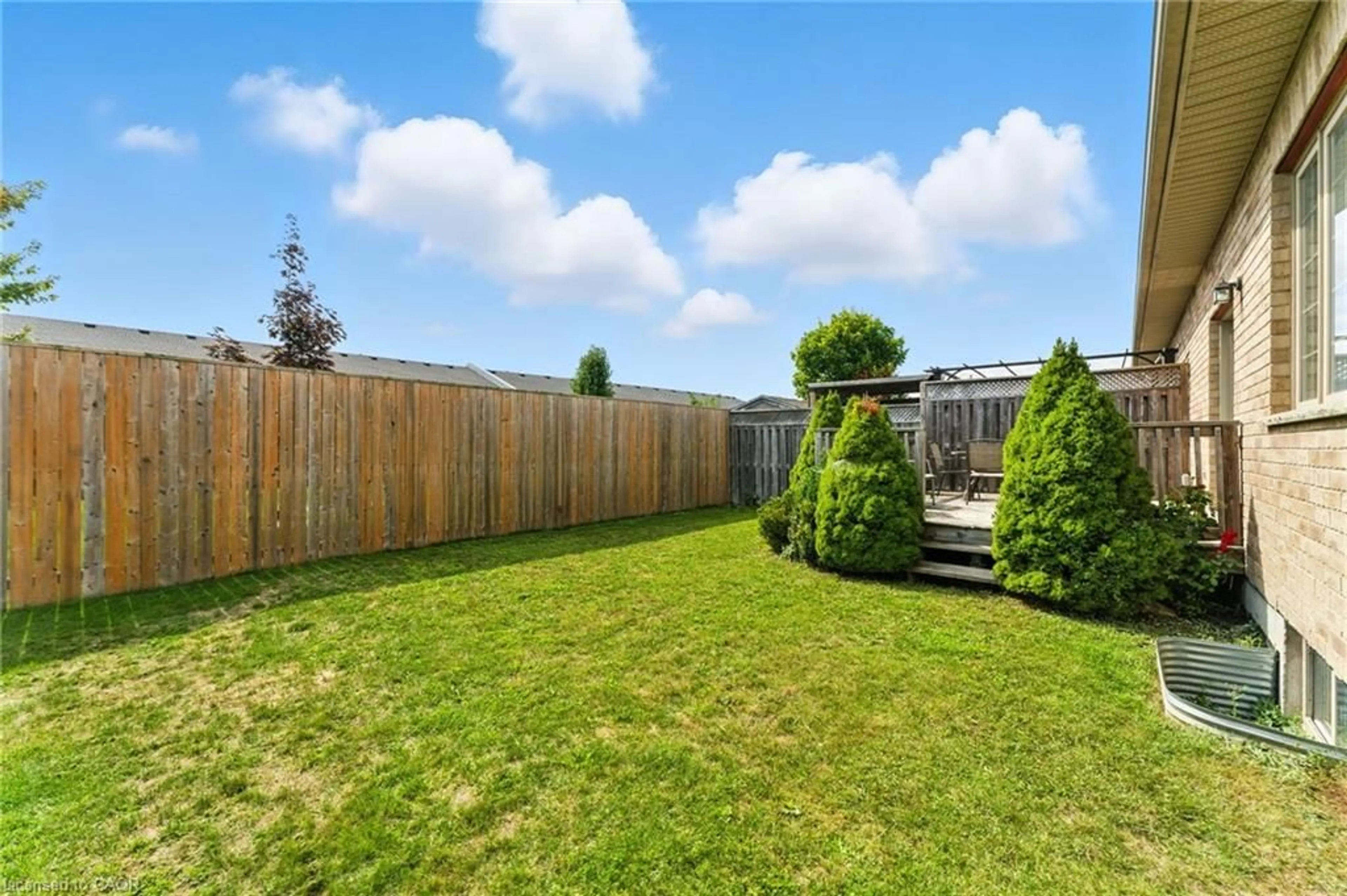 Patio, forest/trees view for 242 Hutton St, Listowel Ontario N4W 0C1