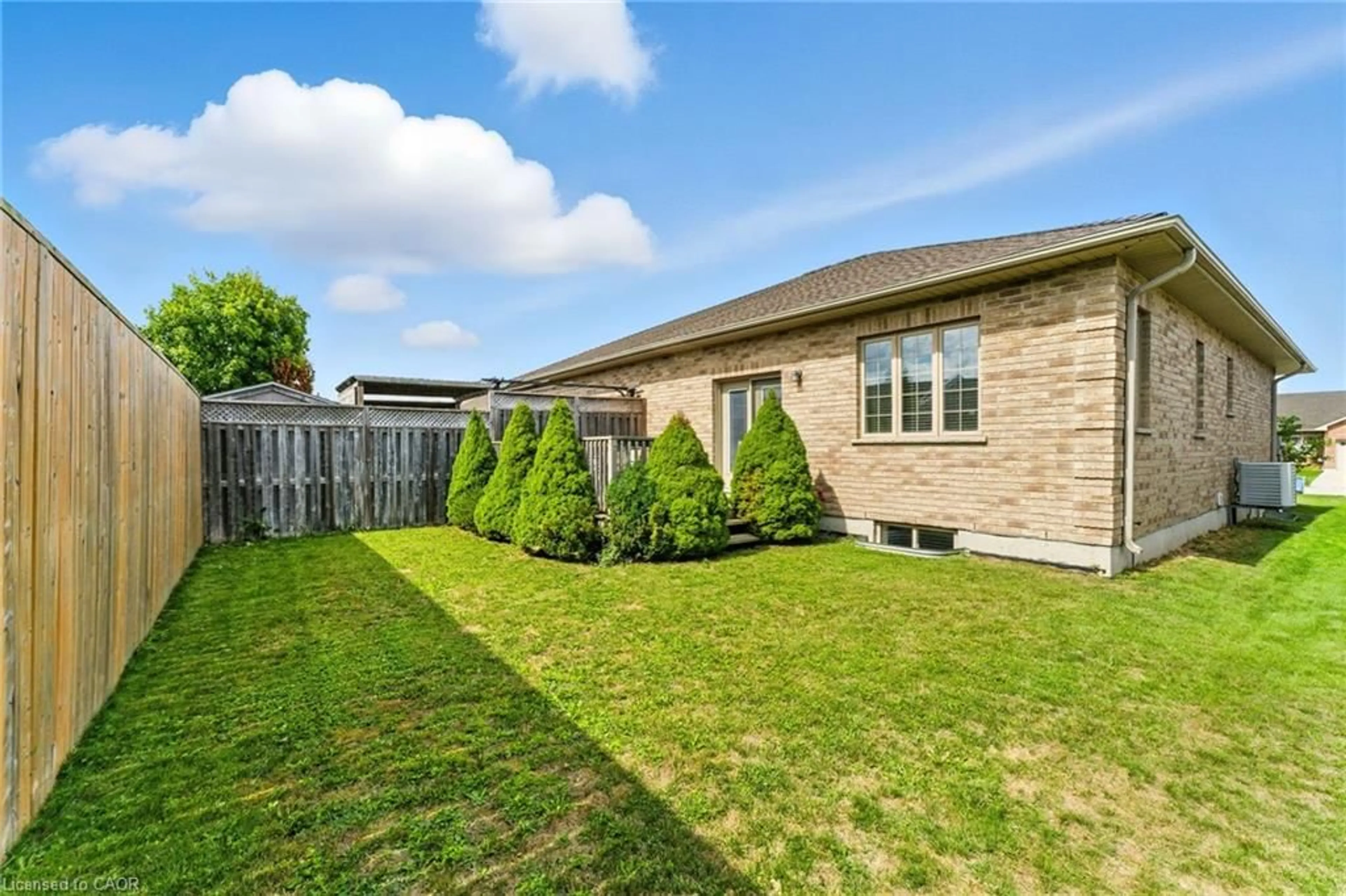 Home with brick exterior material, street for 242 Hutton St, Listowel Ontario N4W 0C1