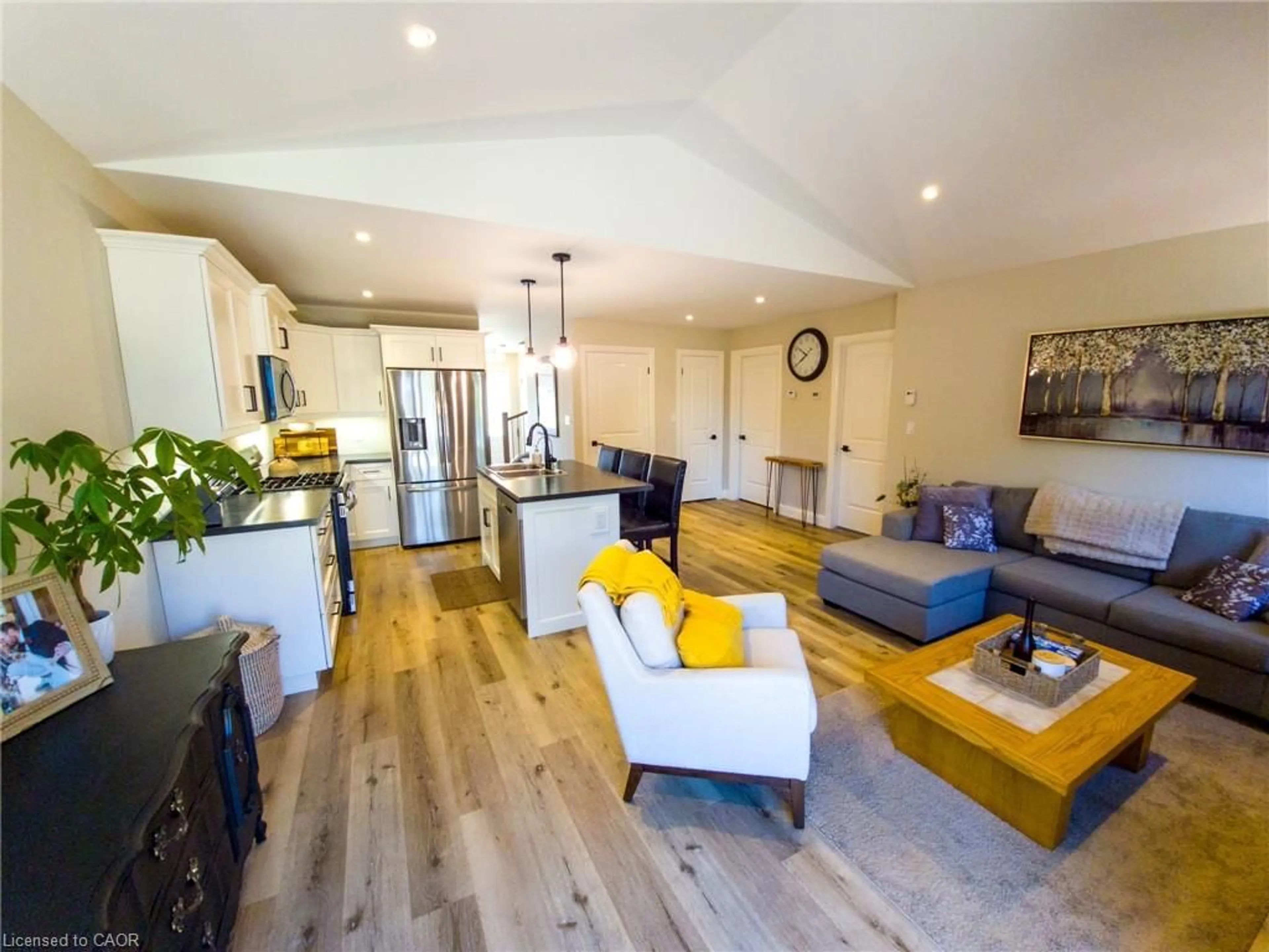 Living room with furniture, wood/laminate floor for 822 Main St, Port Dover Ontario N0A 1N0