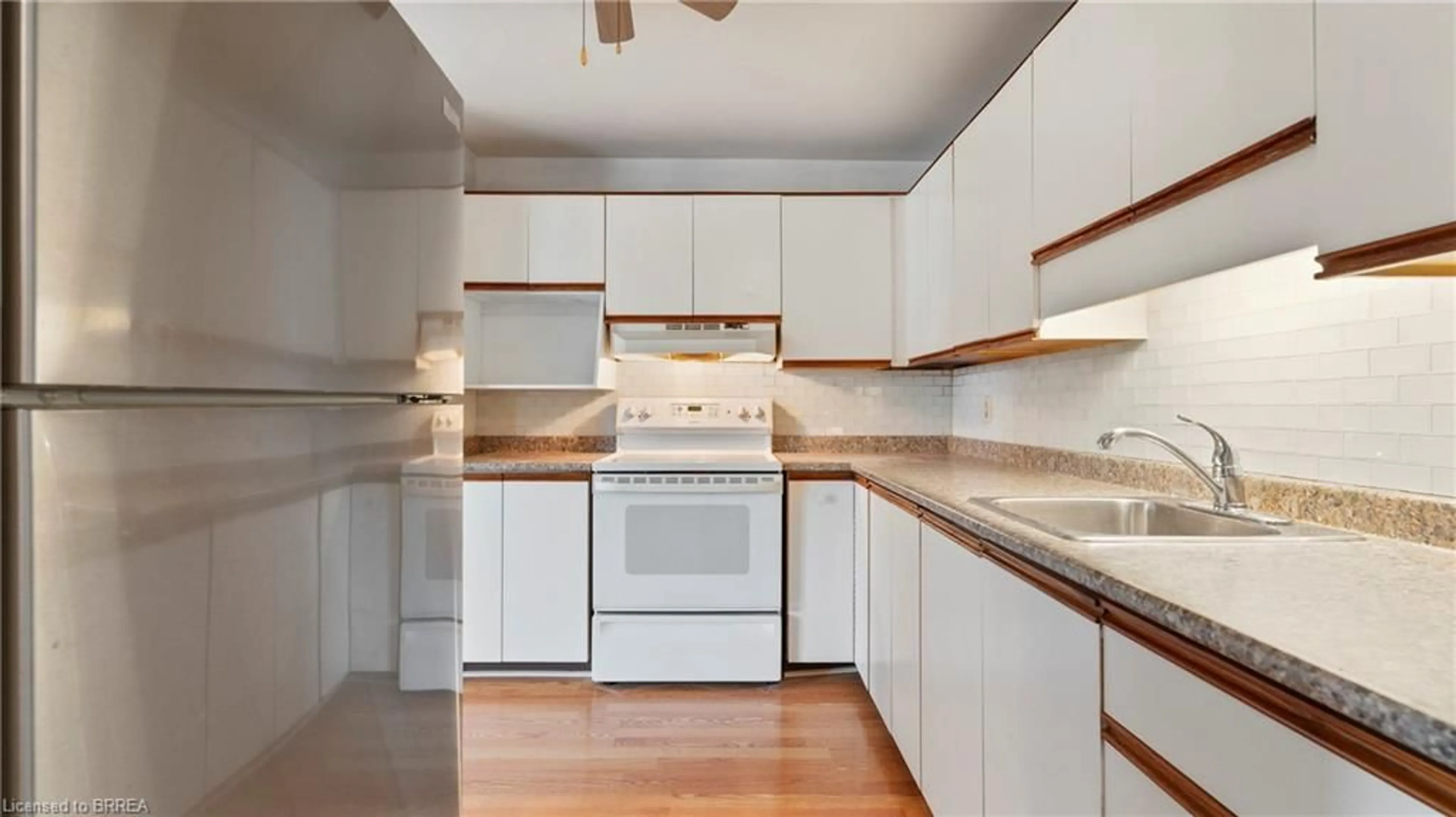 Standard kitchen, wood/laminate floor for 421 Fairview Dr #101, Brantford Ontario N3R 7M3