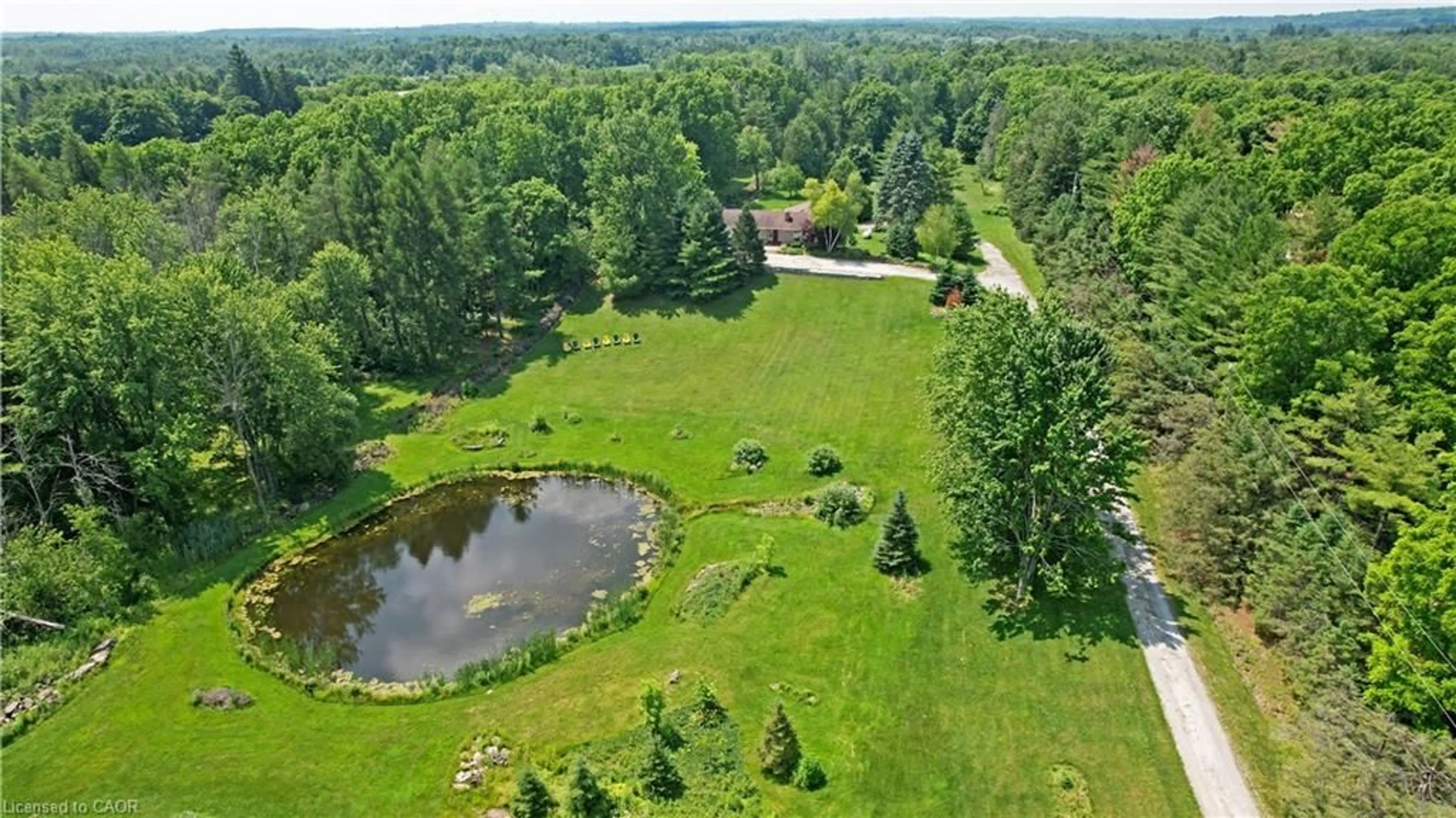 A pic from outside/outdoor area/front of a property/back of a property/a pic from drone, water/lake/river/ocean view for 10566 Second Line, Campbellville Ontario L0P 1B0