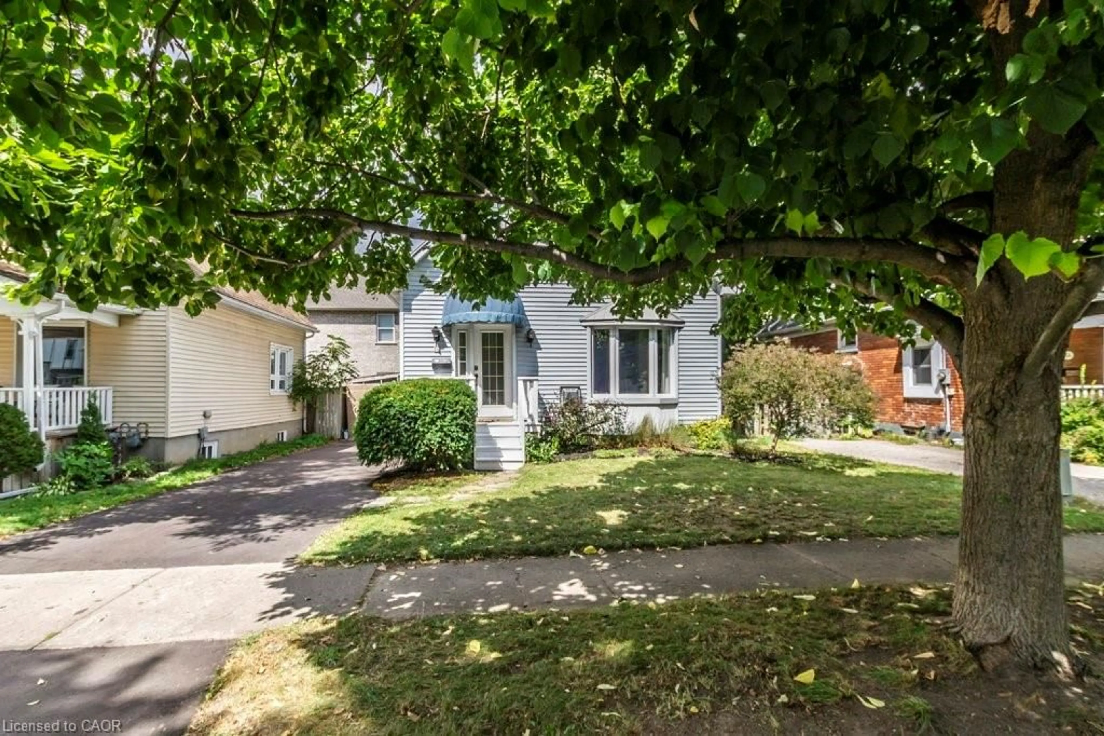 A pic from outside/outdoor area/front of a property/back of a property/a pic from drone, street for 56 John St, Waterloo Ontario N2L 1B4