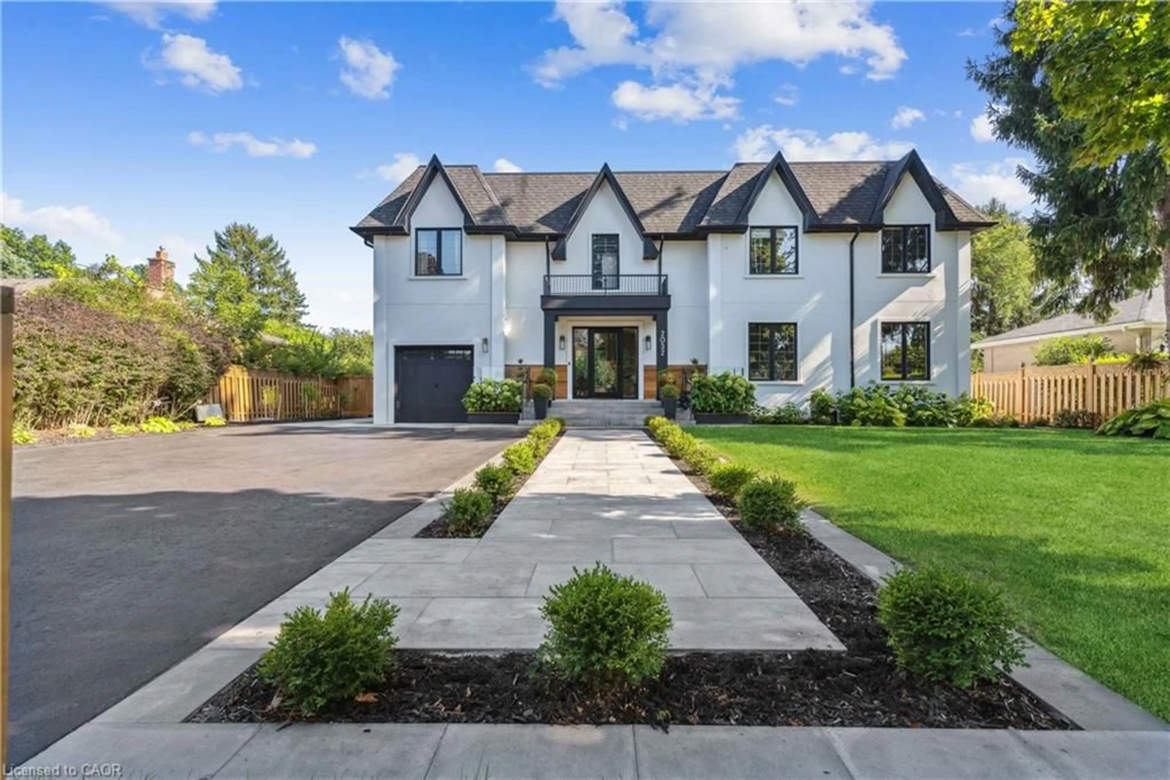 Home with brick exterior material, street for 2032 Rebecca St, Oakville Ontario L6L 2A2