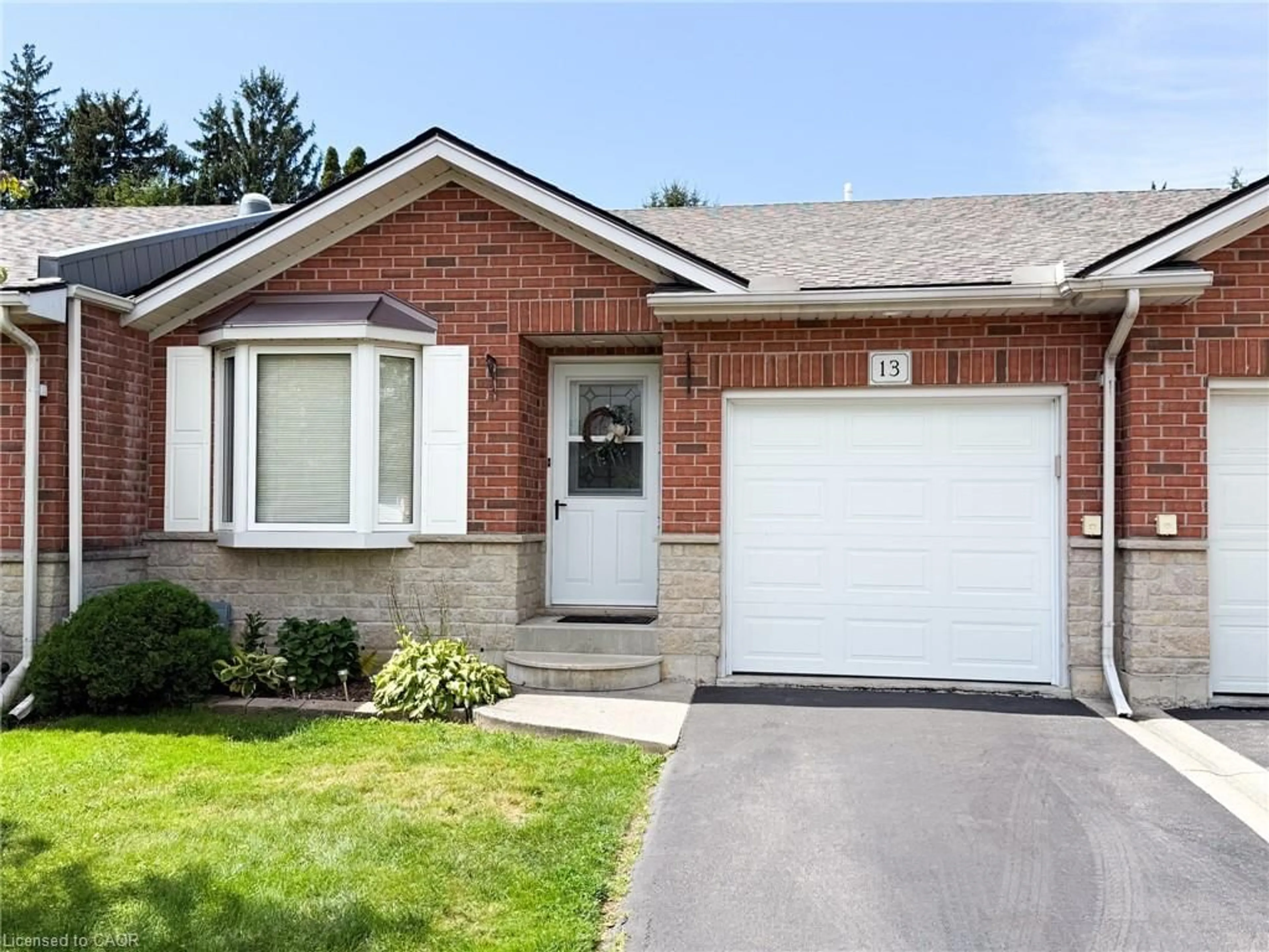 Home with brick exterior material, street for 13 Clonmel Lane, Port Dover Ontario N0A 1N1