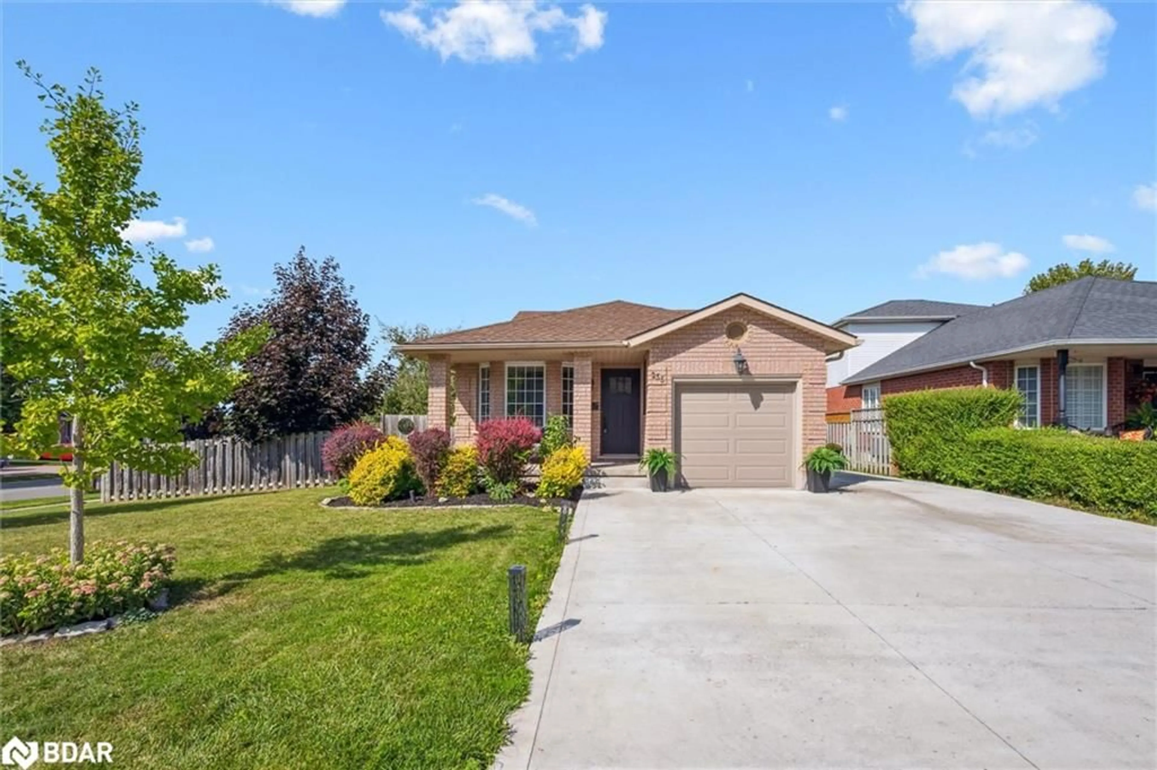 Home with brick exterior material, street for 255 Deerpath Dr, Guelph Ontario N1K 1T8