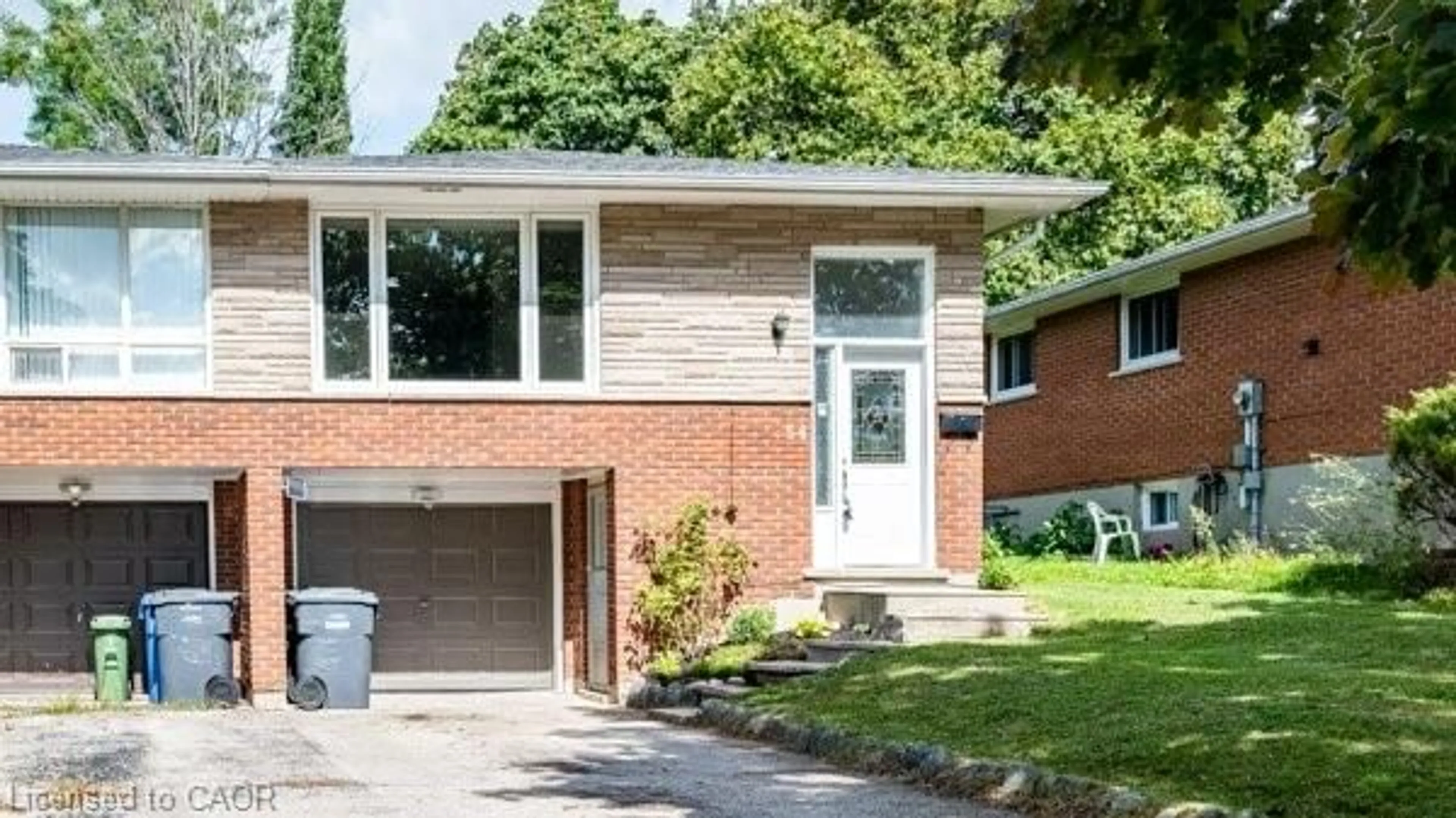 Home with brick exterior material, street for 54 Conroy Cres, Guelph Ontario N1G 2V6