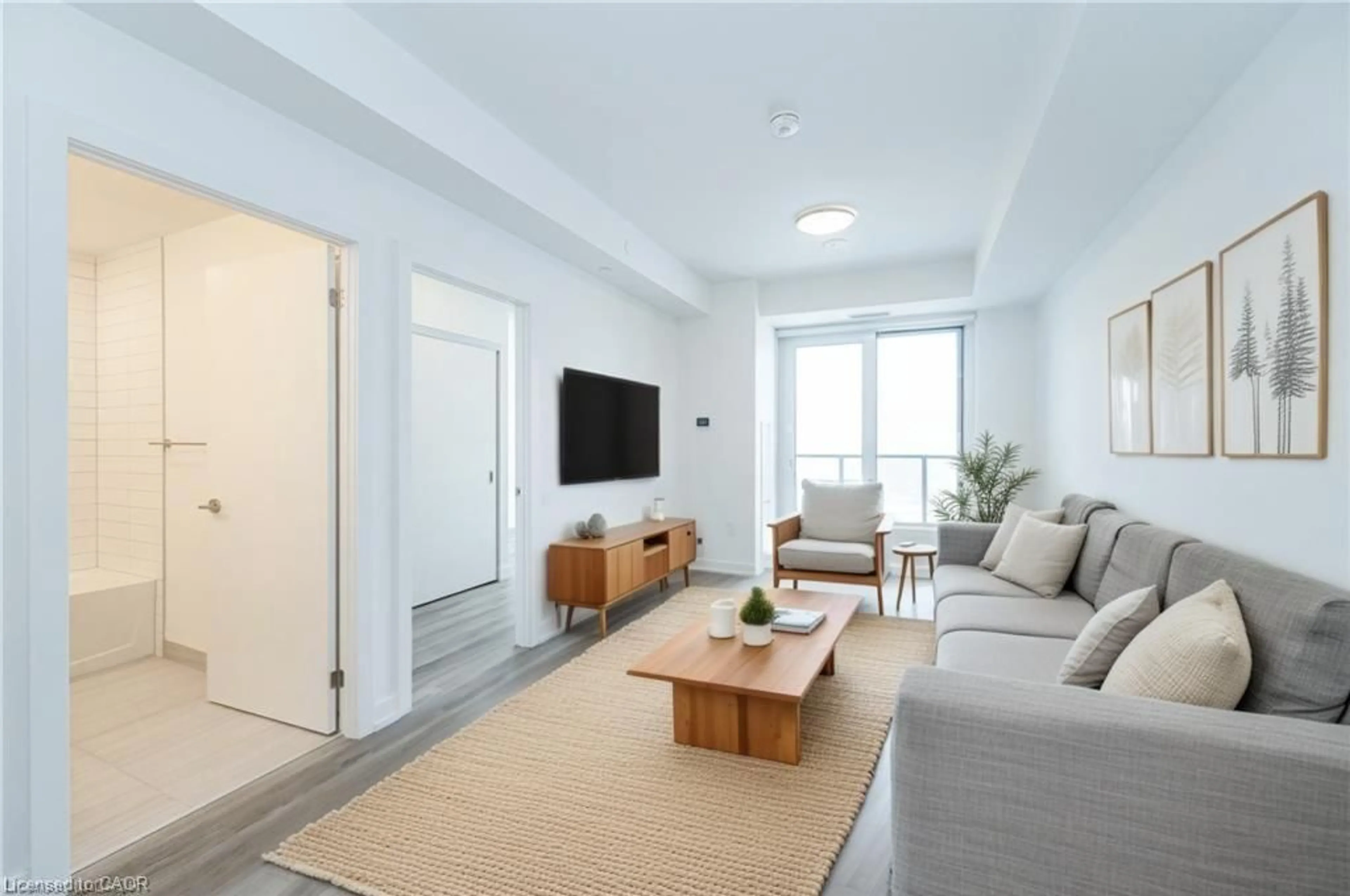 Living room with furniture, unknown for 15 Wellington St #907, Kitchener Ontario N2G 0E4