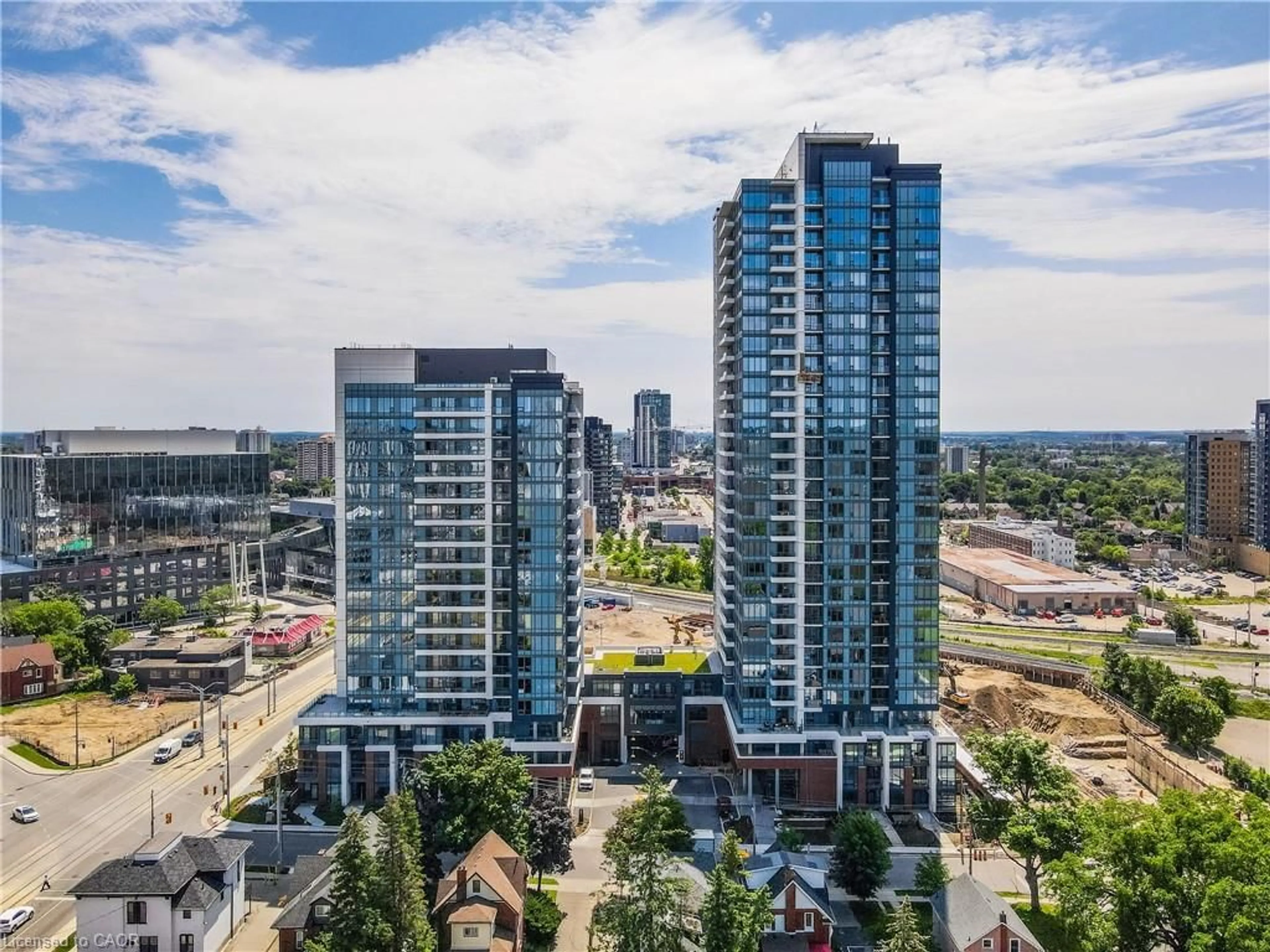 A pic from outside/outdoor area/front of a property/back of a property/a pic from drone, city buildings view from balcony for 15 Wellington St #907, Kitchener Ontario N2G 0E4