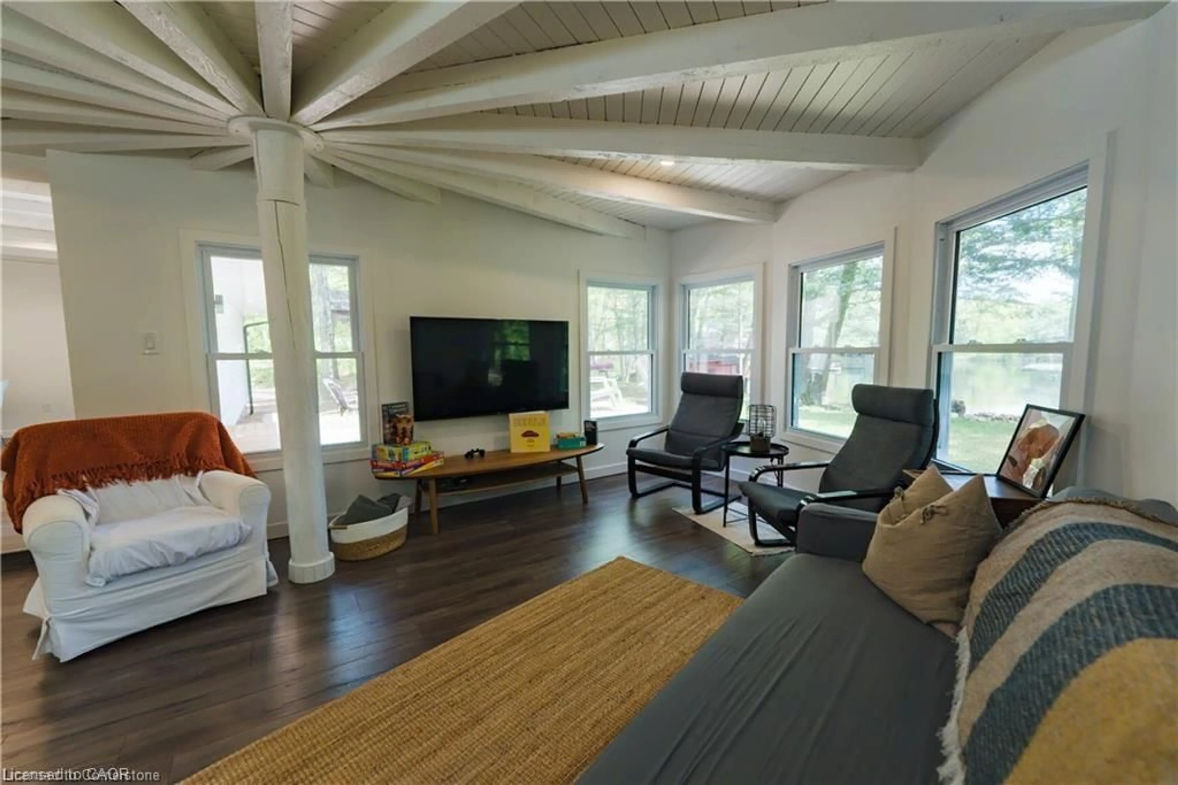 Living room with furniture, wood/laminate floor for 847 West Kosh Rd, Havelock Ontario K0L 2H0