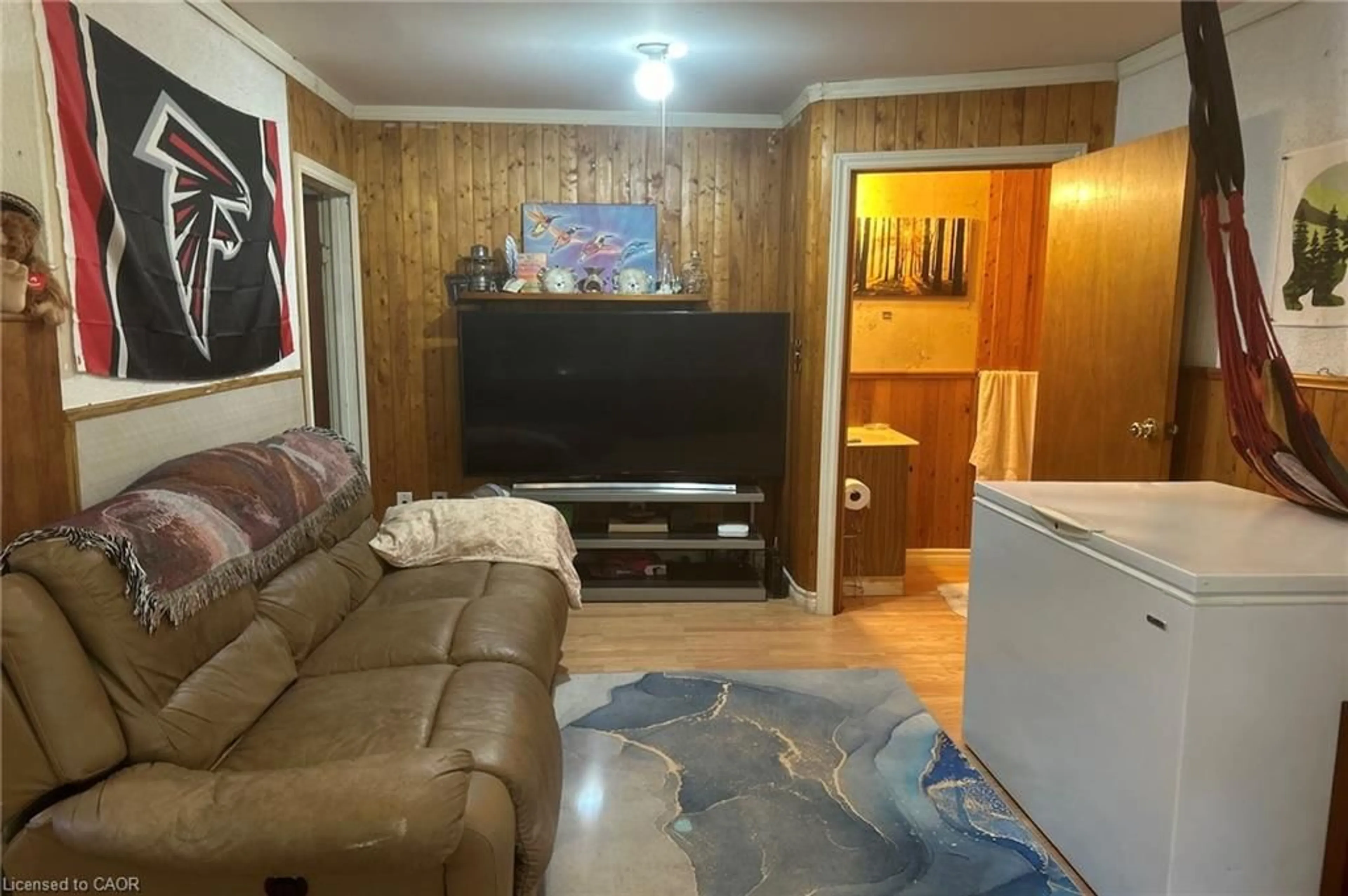 Living room with furniture, wood/laminate floor for 387 River St, Massey Ontario P0P 1P0