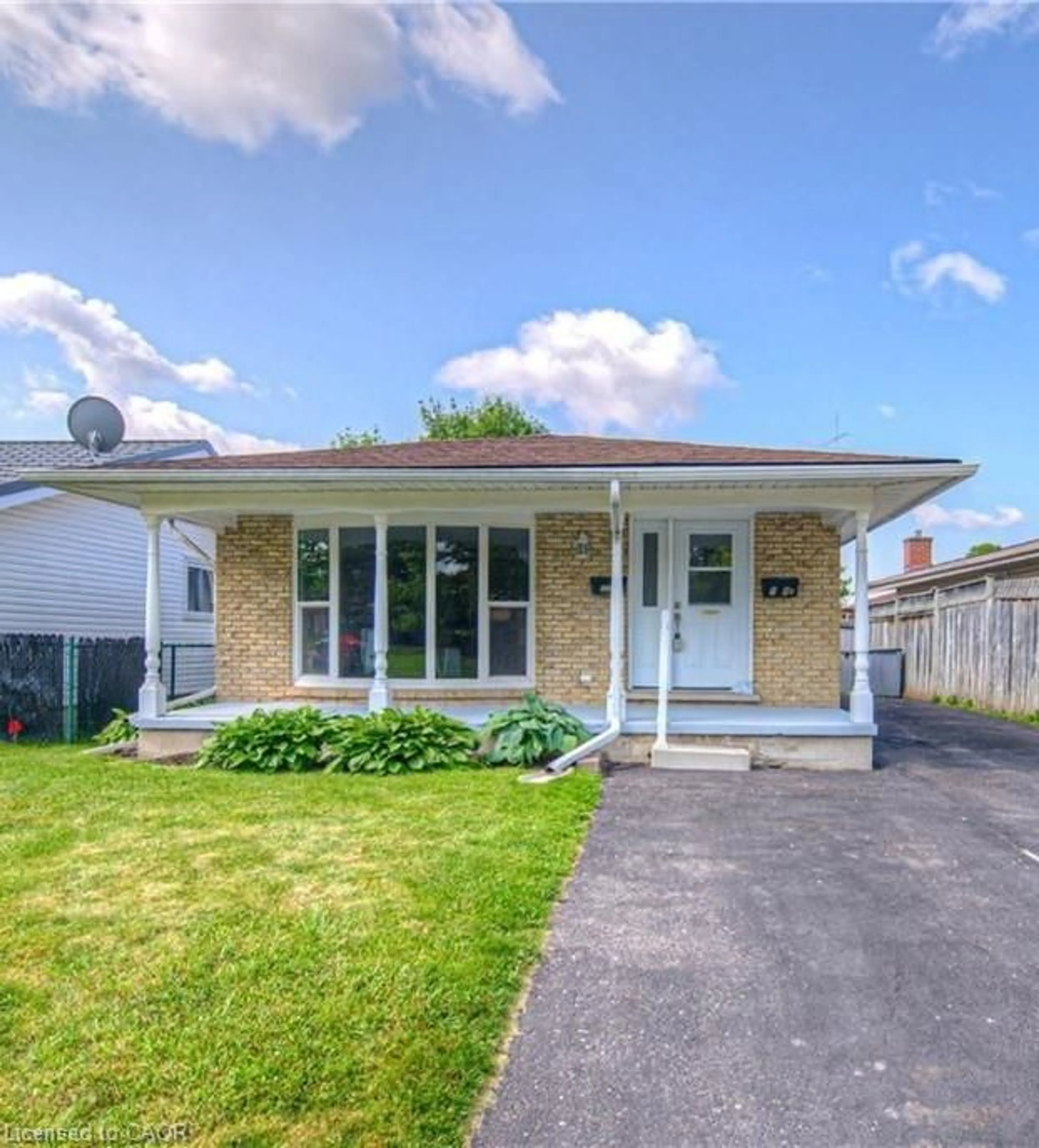 Home with brick exterior material, street for 119 Kingswood Dr, Kitchener Ontario N2E 1B2