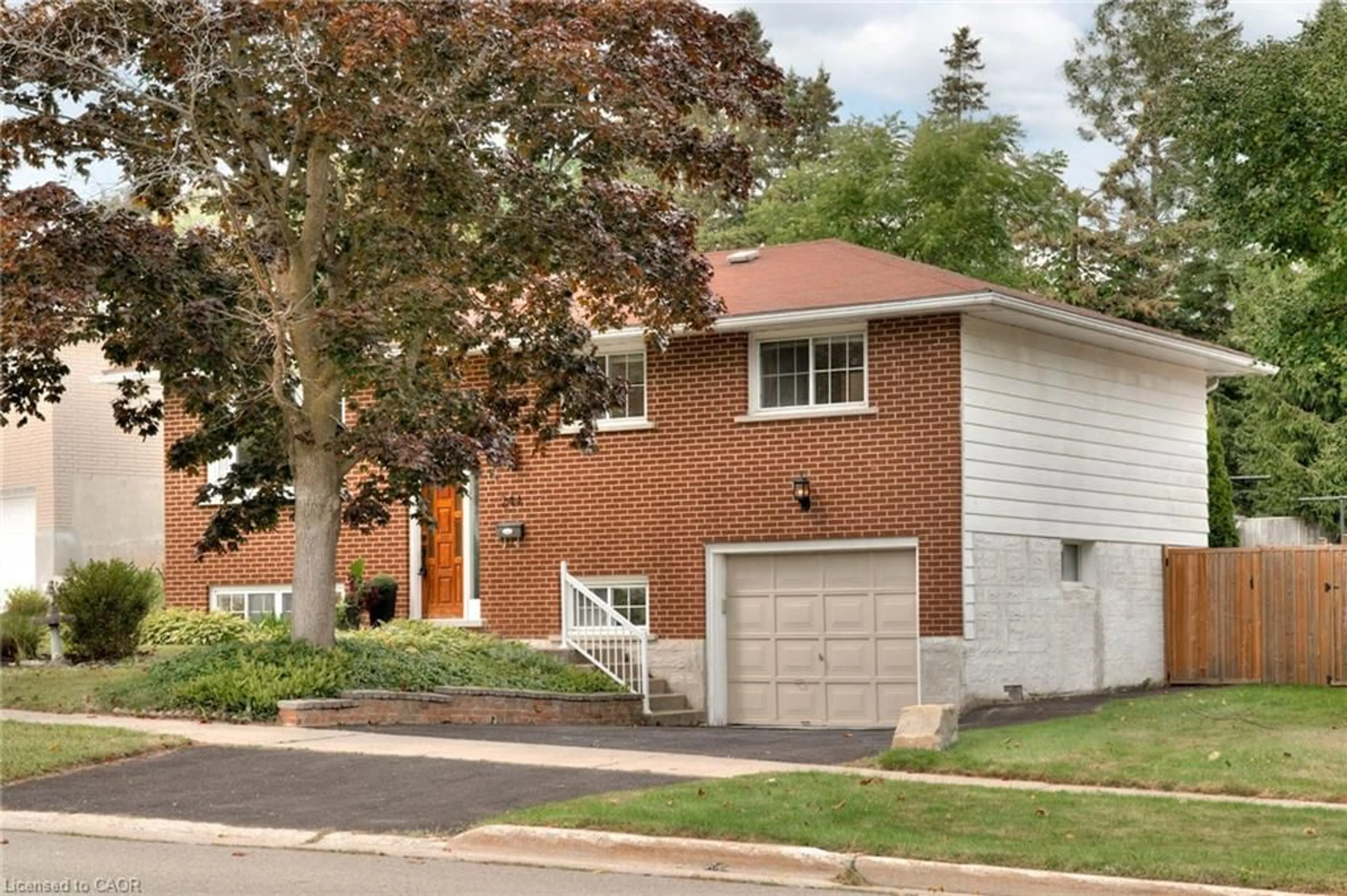 Home with brick exterior material, street for 244 Westwood Dr, Kitchener Ontario N2M 2L2