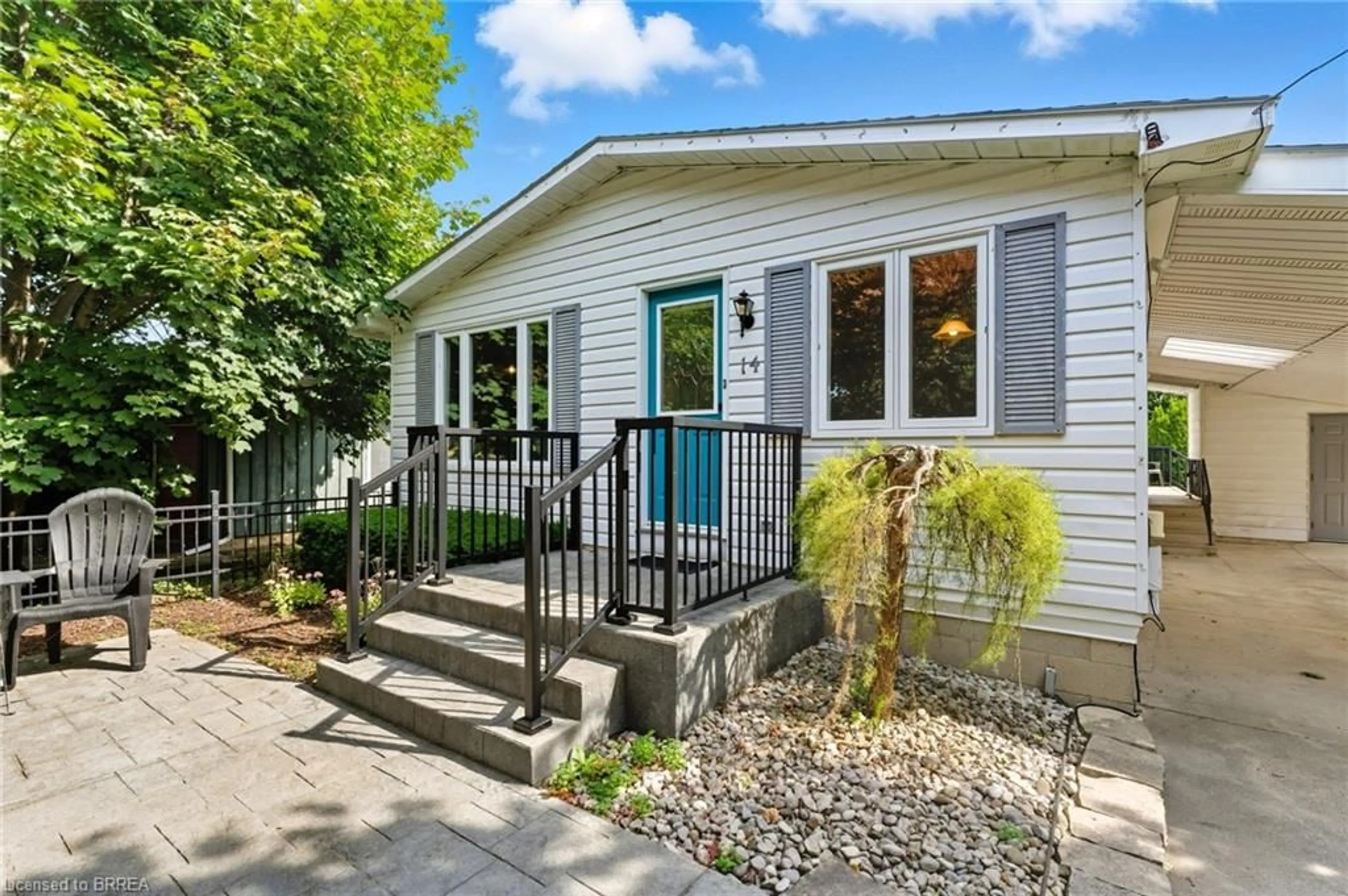 Home with vinyl exterior material, street for 14 Jackson Hts, Port Dover Ontario N0A 1N5