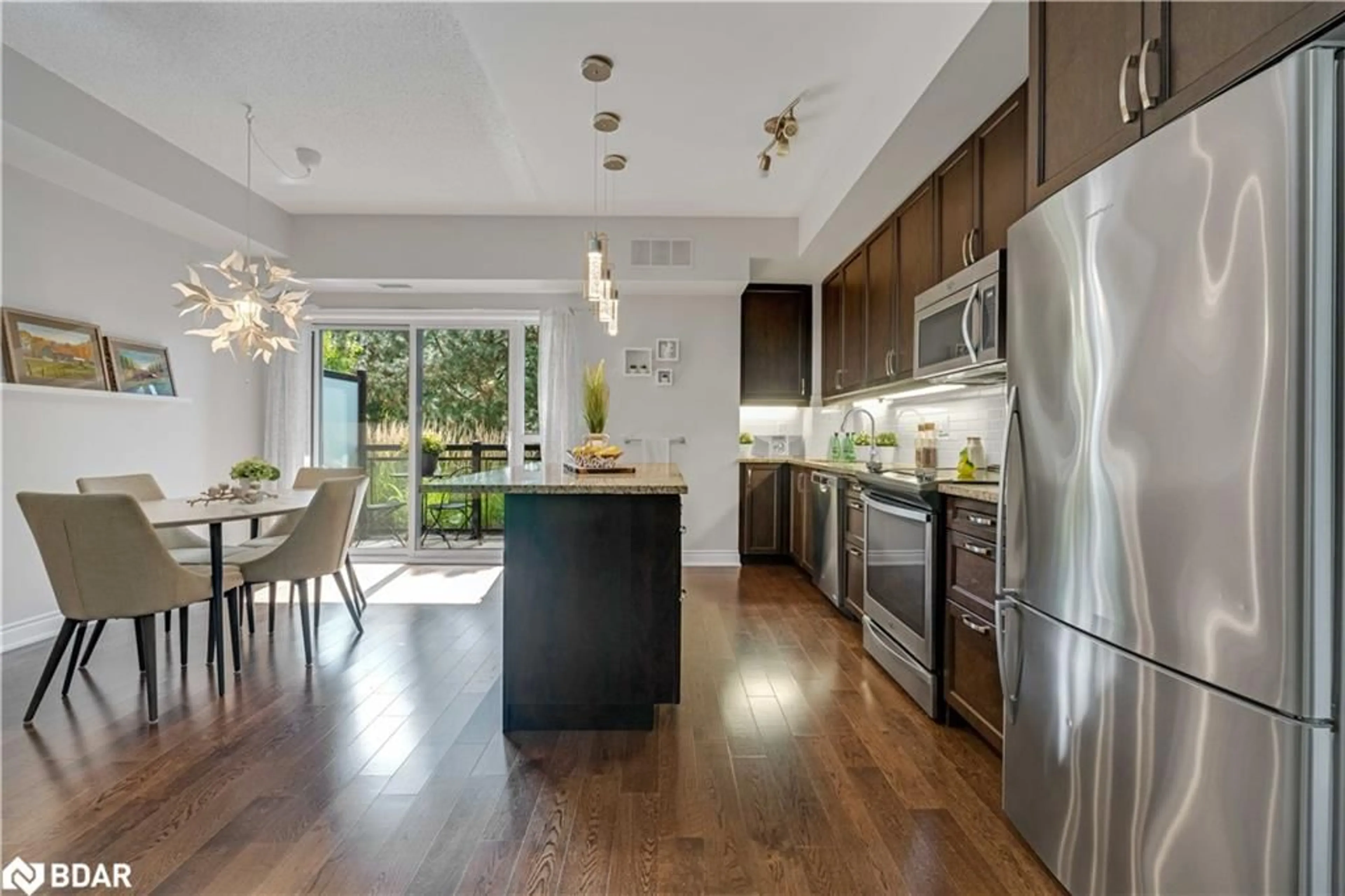 Open concept kitchen, unknown for 3170 Erin Mills Pky #108, Mississauga Ontario L5L 0B6