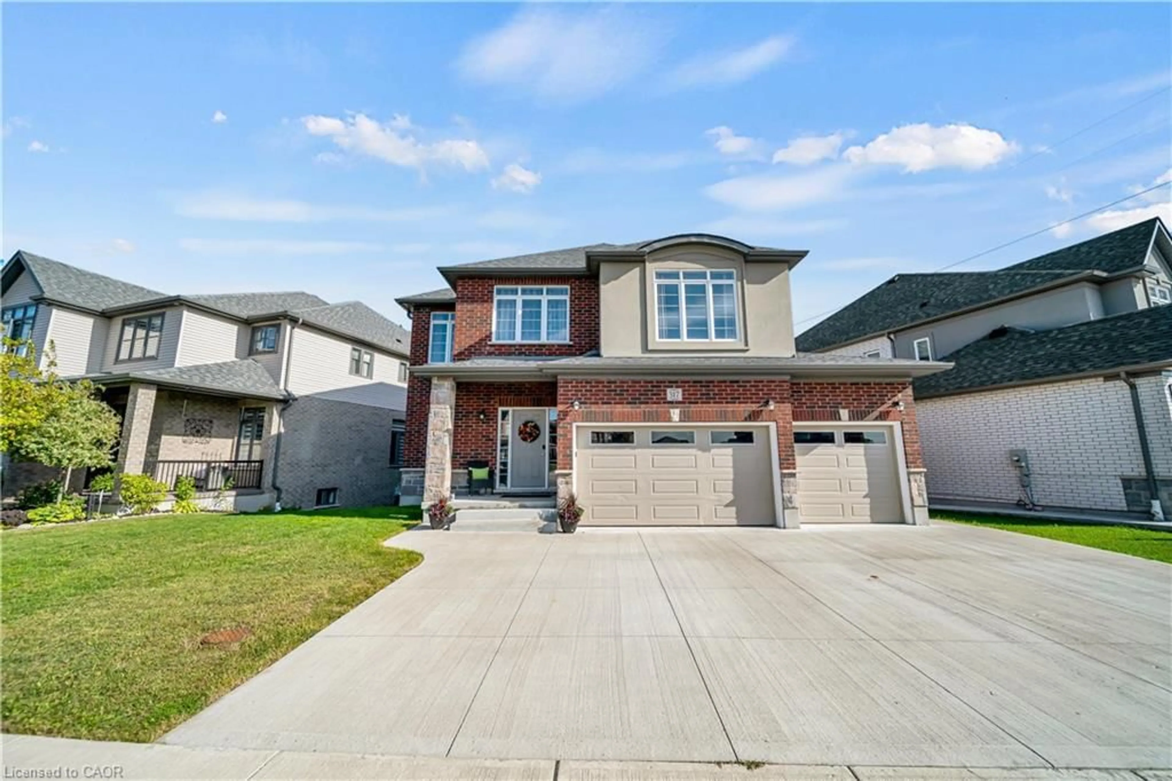 Home with brick exterior material, street for 317 Blair Creek Drive Dr, Kitchener Ontario N2P 0G4