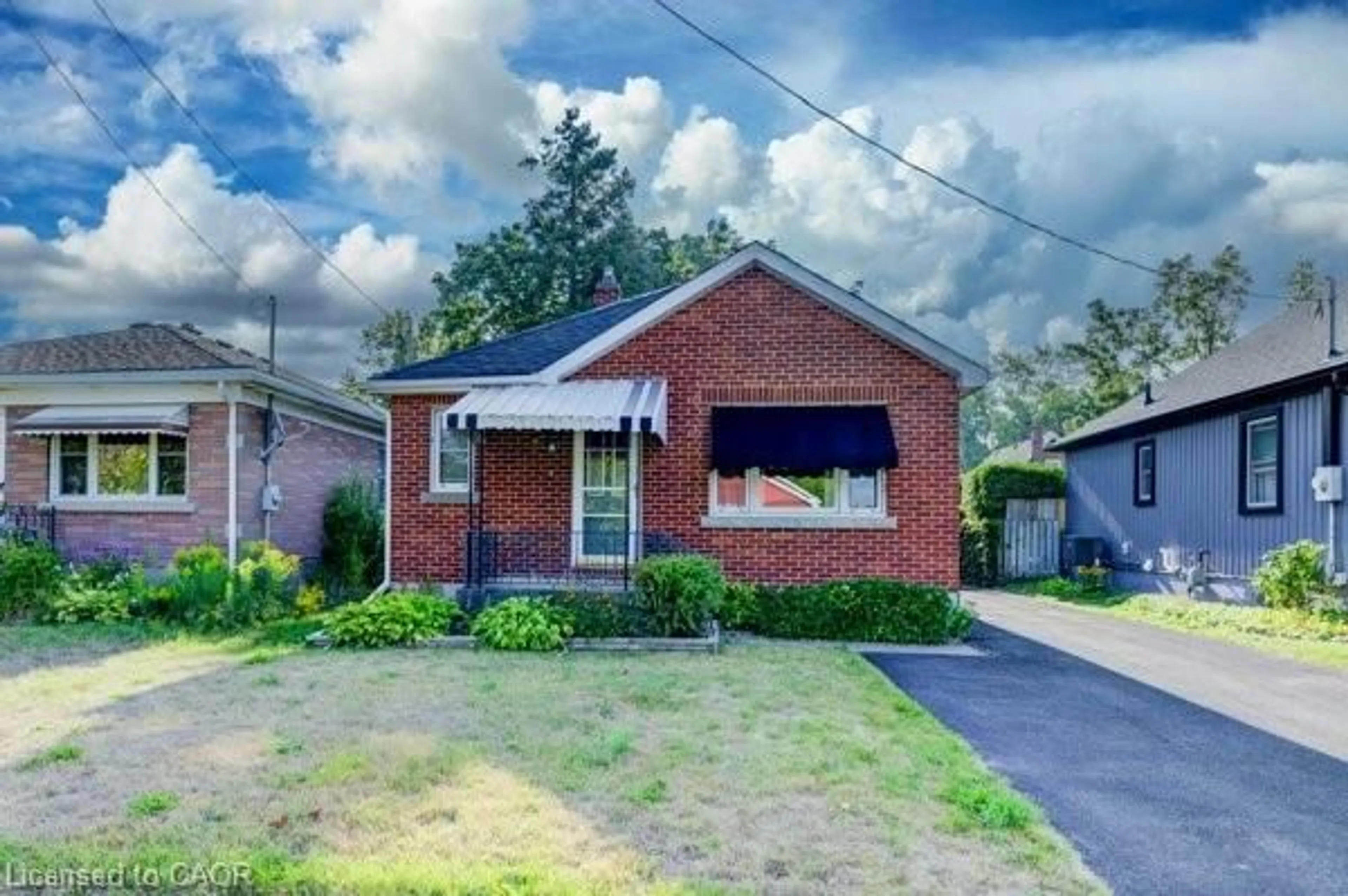 Home with brick exterior material, street for 255 Grand St, Brantford Ontario N3R 4C6
