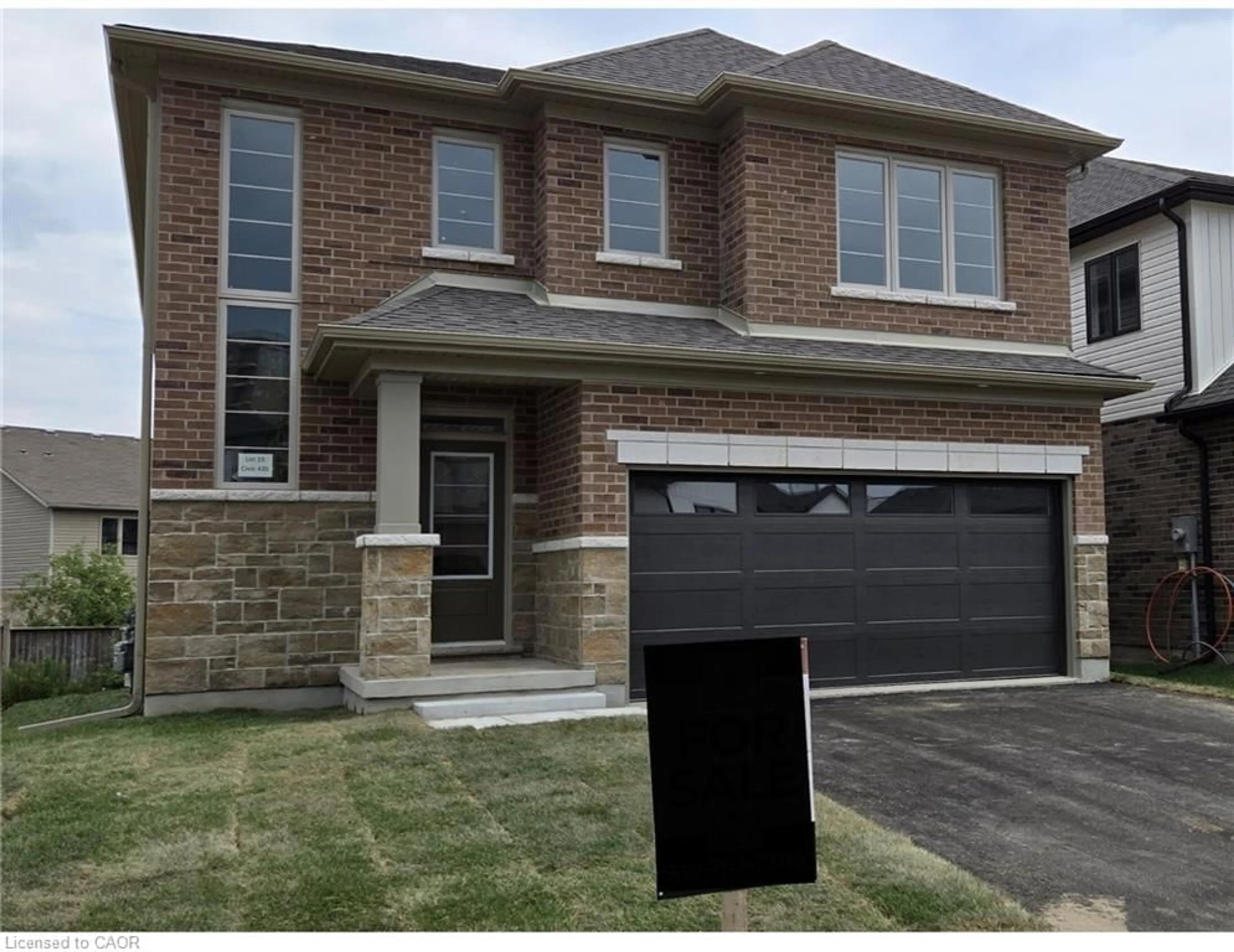 Home with brick exterior material, street for 435 Westhaven Dr, Waterloo Ontario N2T 0A4