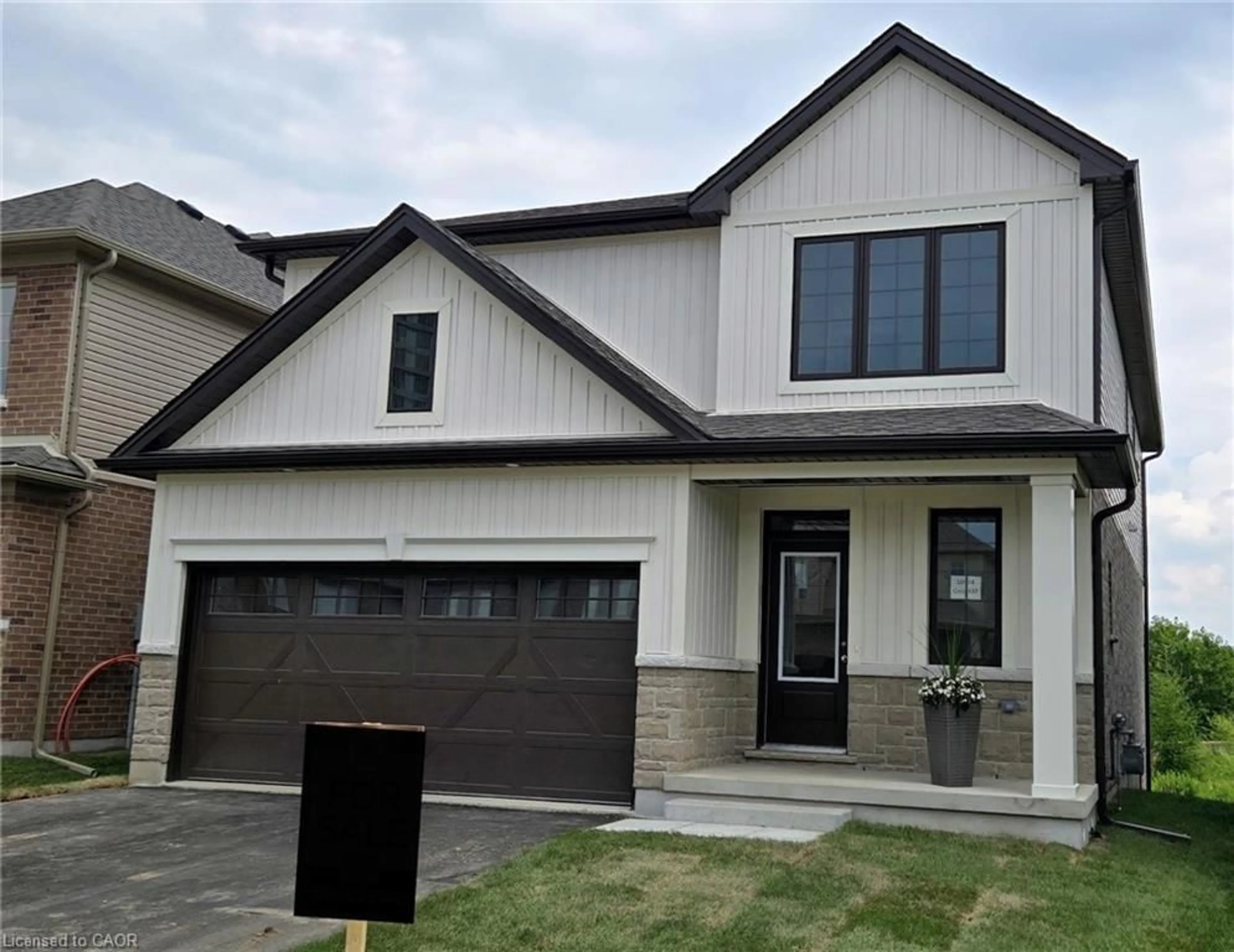 Home with brick exterior material, street for 437 Westhaven St, Waterloo Ontario N2T 0A4