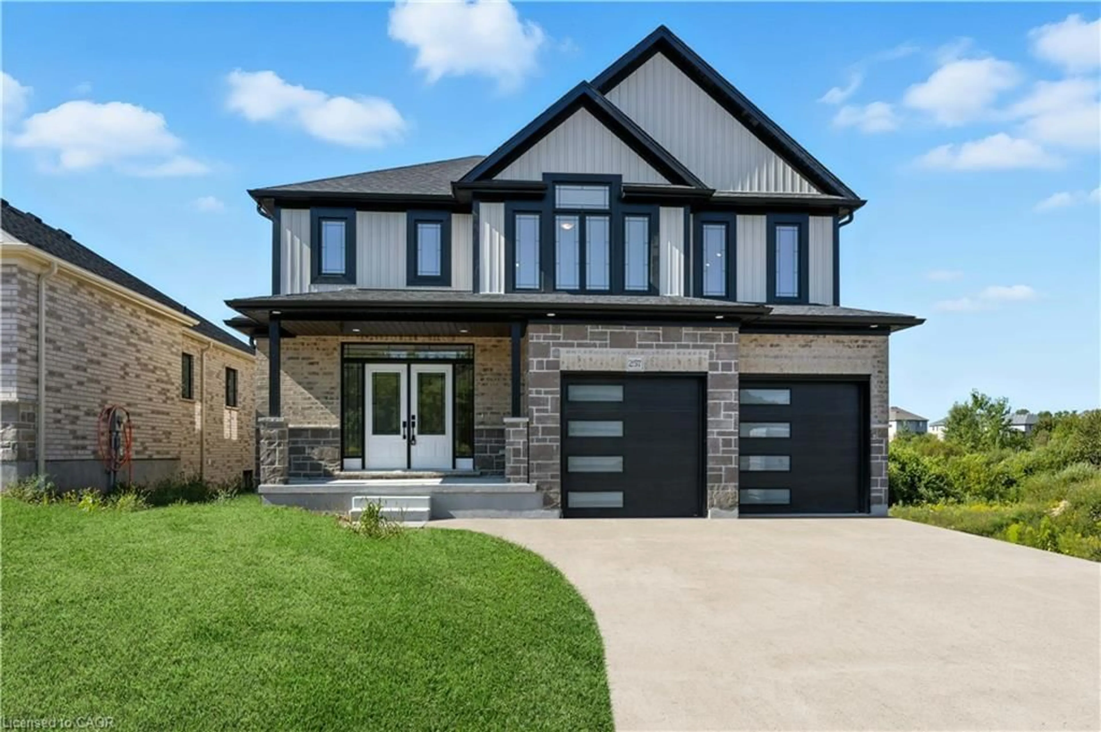 Home with brick exterior material, street for 257 Ladyslipper Dr, Waterloo Ontario N2V 0C3