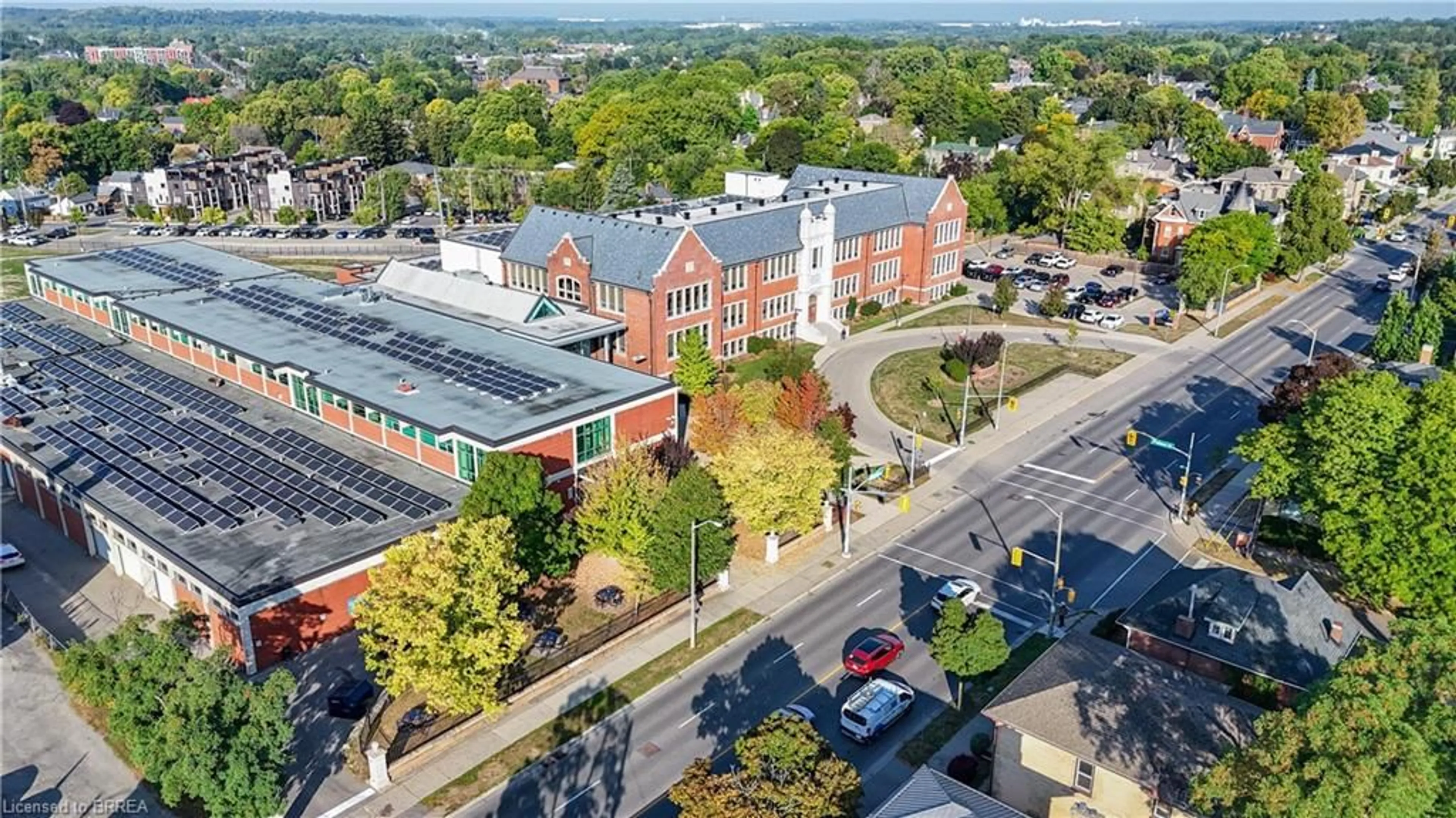 A pic from outside/outdoor area/front of a property/back of a property/a pic from drone, city buildings view from balcony for 113 Brant Ave, Brantford Ontario N3T 3H4