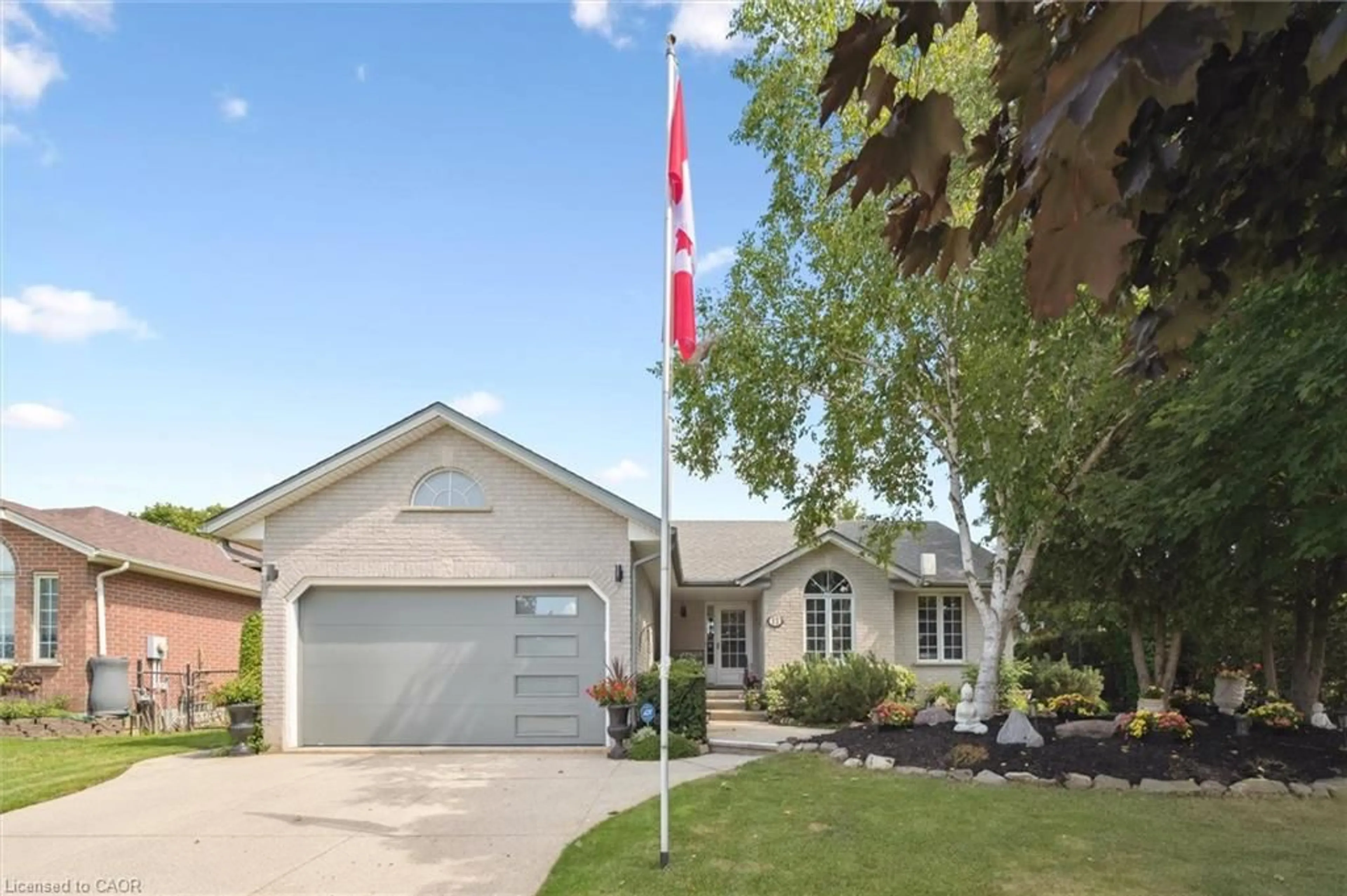 Home with vinyl exterior material, street for 11 Keating Dr, Elora Ontario N0B 1S0