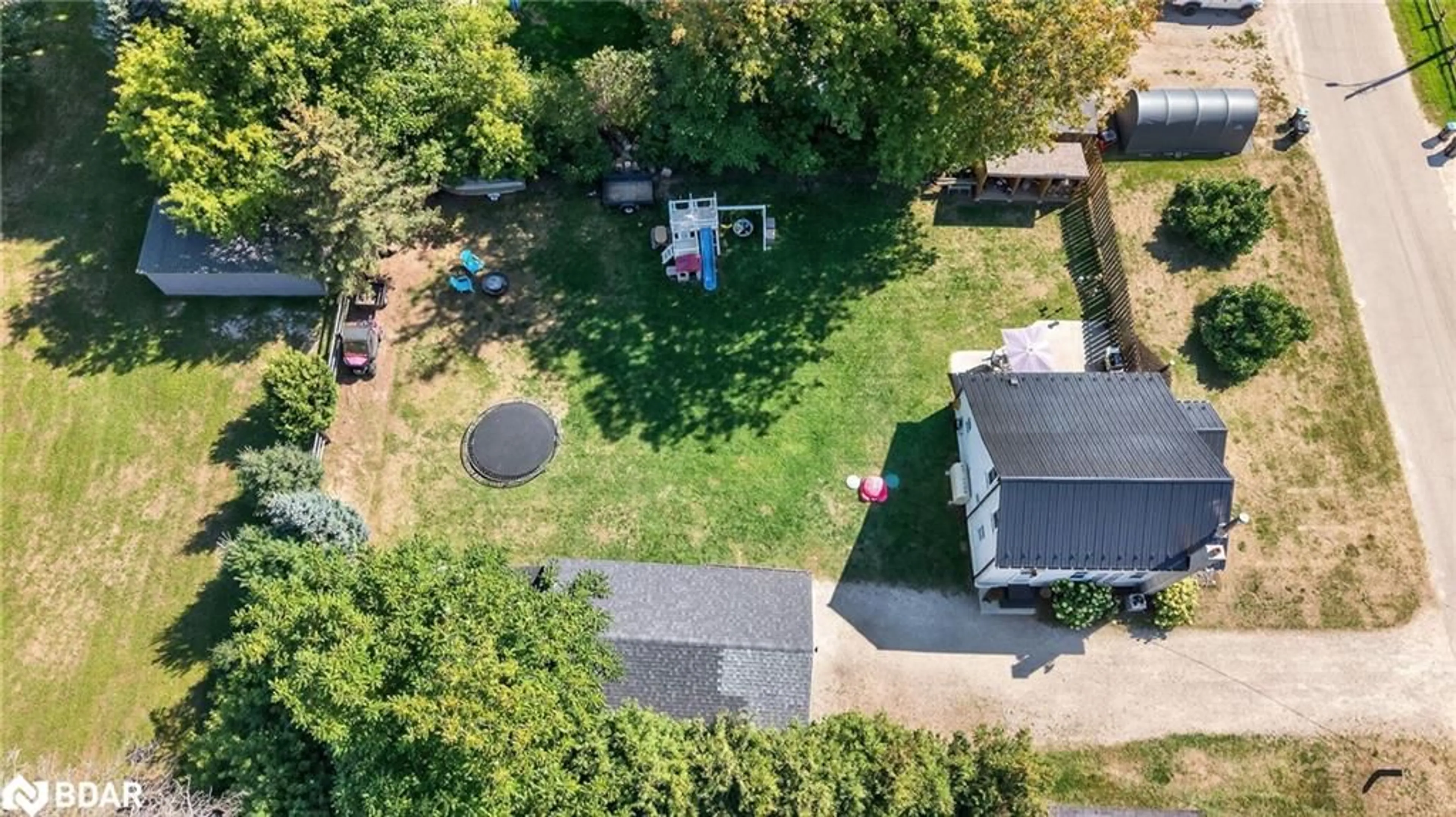 A pic from outside/outdoor area/front of a property/back of a property/a pic from drone, street for 14 Centre St, Lisle Ontario L0M 1M0