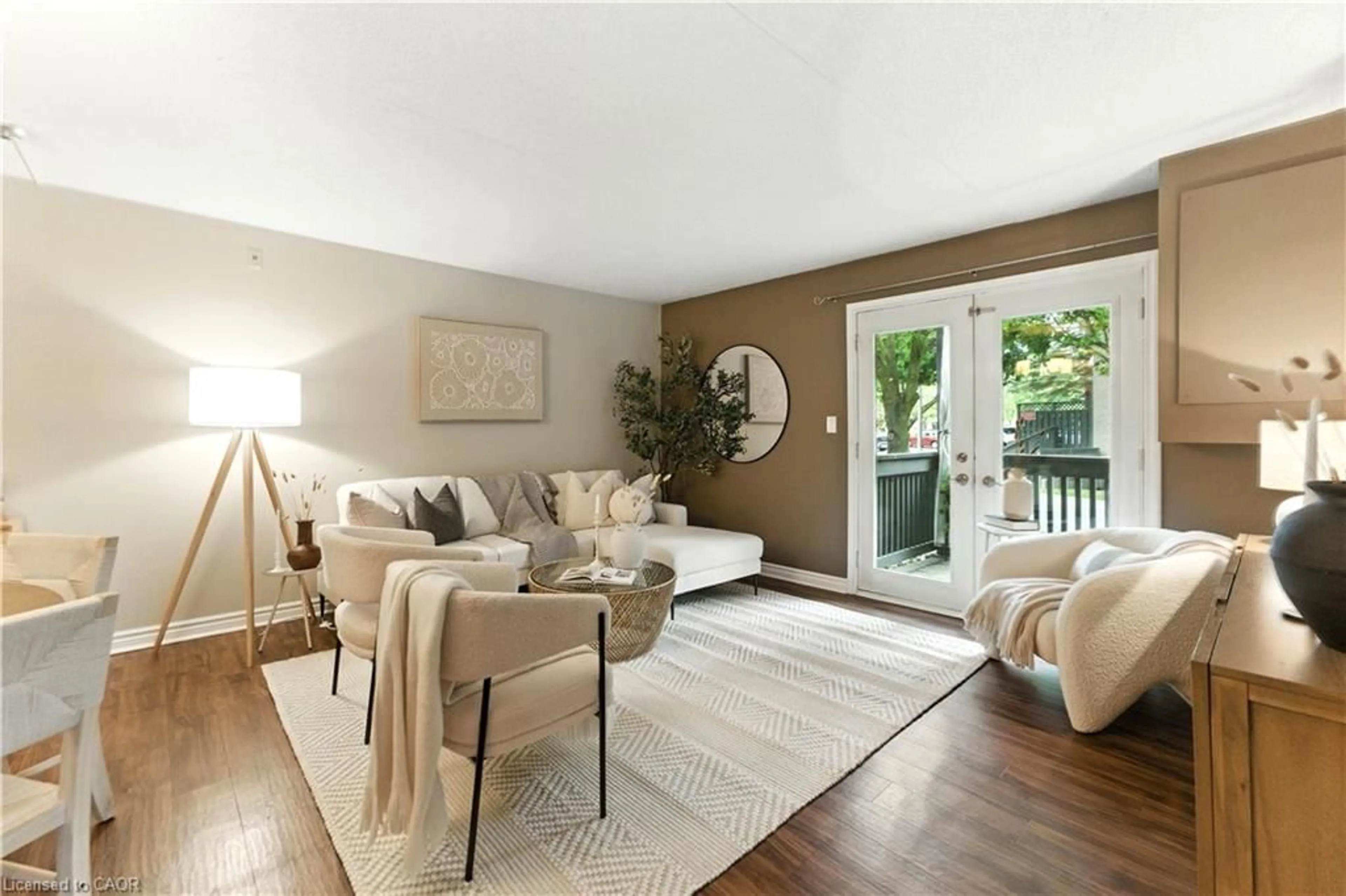 Living room with furniture, wood/laminate floor for 2030 Cleaver Ave #124, Burlington Ontario L7M 4C3