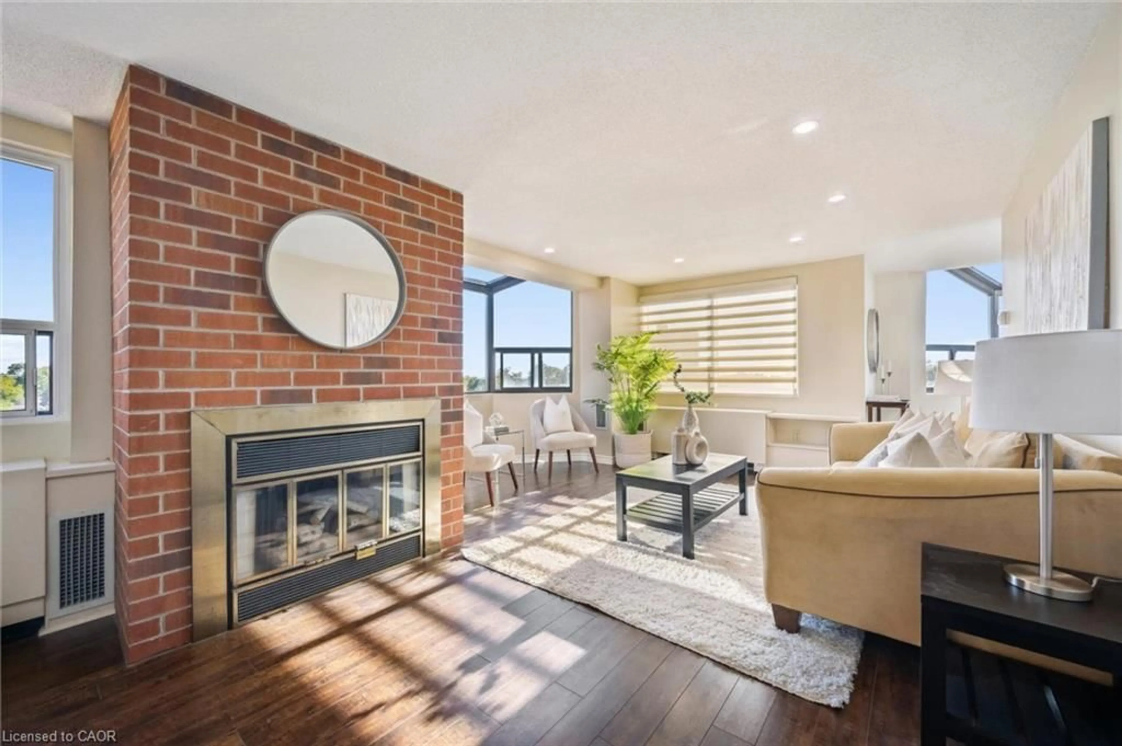 Living room with furniture, unknown for 20 Ellen St #610, Kitchener Ontario N2H 6R7