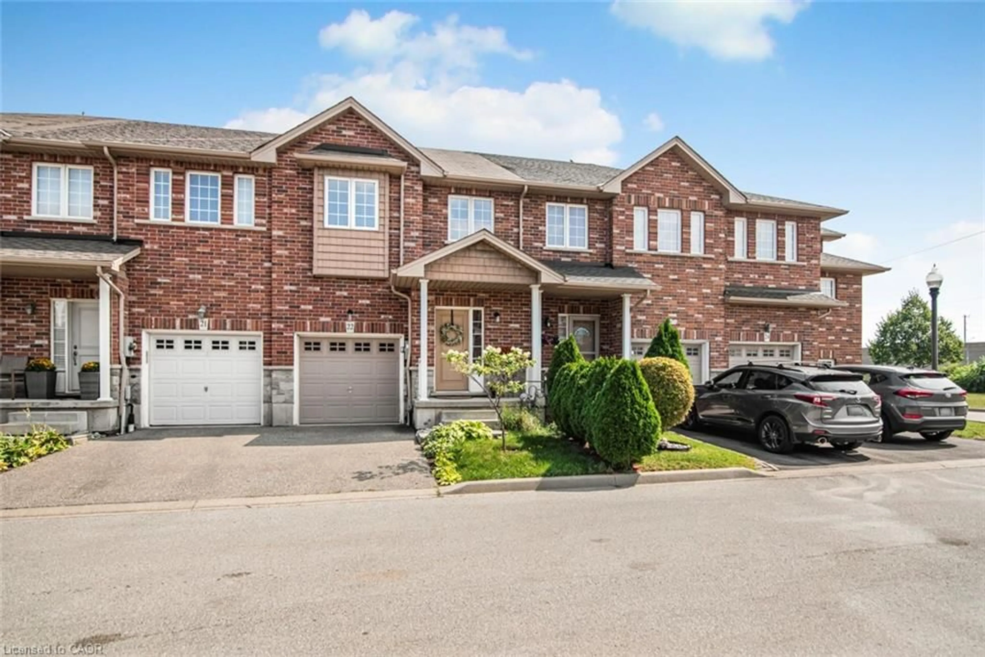 Home with brick exterior material, street for 45 Seabreeze Cres #22, Stoney Creek Ontario L8E 0G1