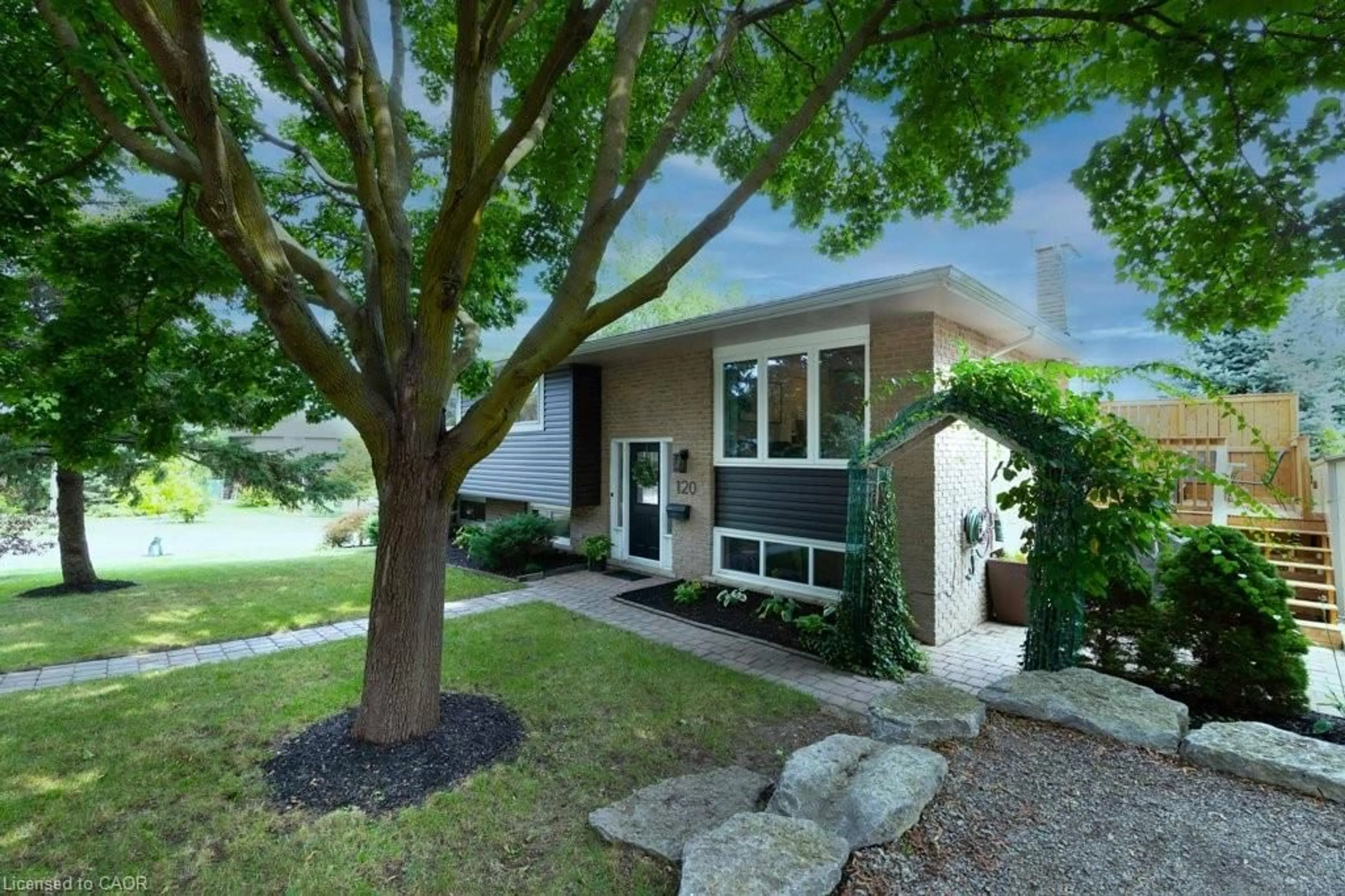 Home with brick exterior material, street for 120 Devonglen Dr, Kitchener Ontario N2E 2J2