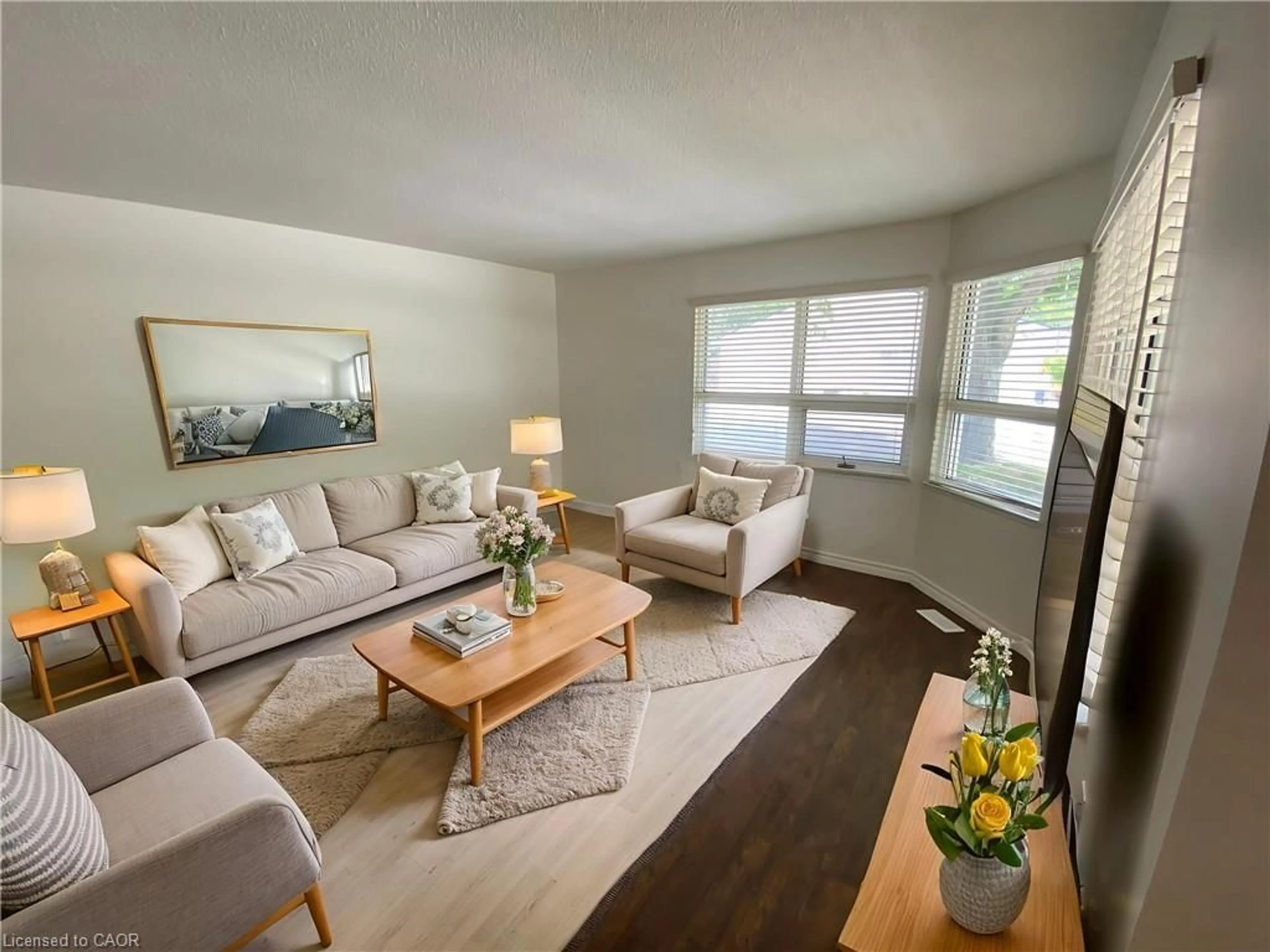 Living room with furniture, wood/laminate floor for 1 Szollosy Cir, Hamilton Ontario L9B 1T8
