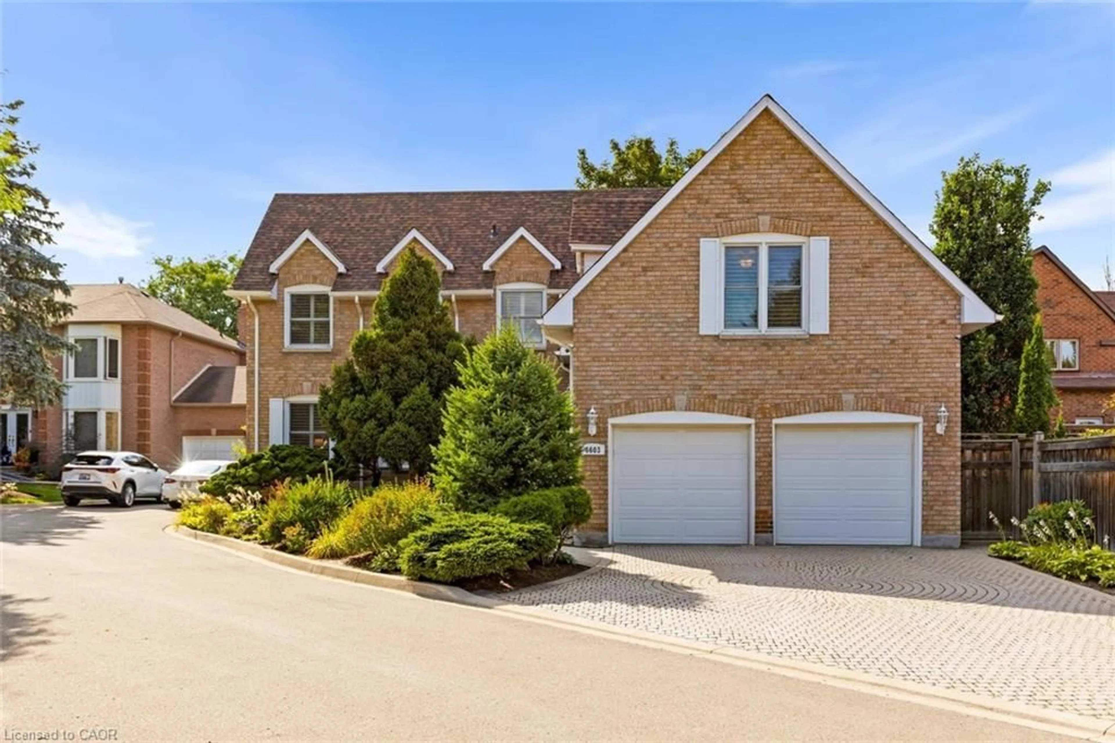 Home with brick exterior material, street for 6603 Tenth Line, Mississauga Ontario L5N 5L5