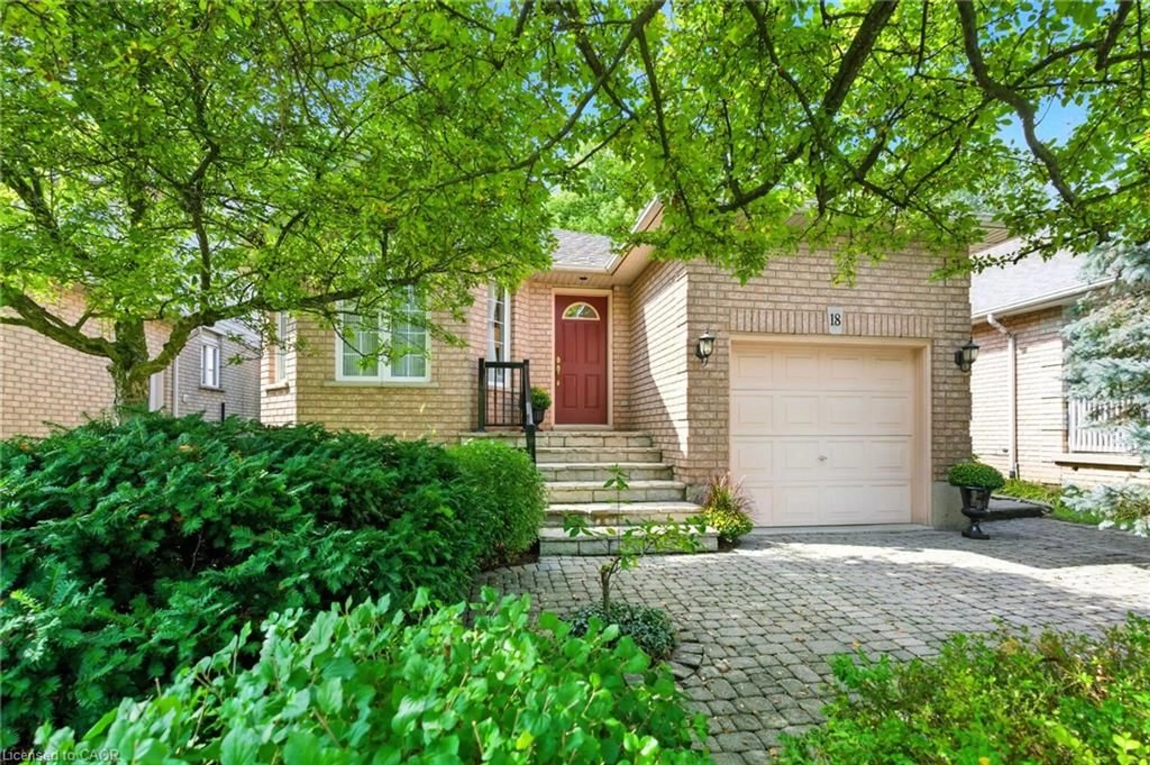 Home with brick exterior material, street for 18 Naples Blvd, Hamilton Ontario L9B 2J2