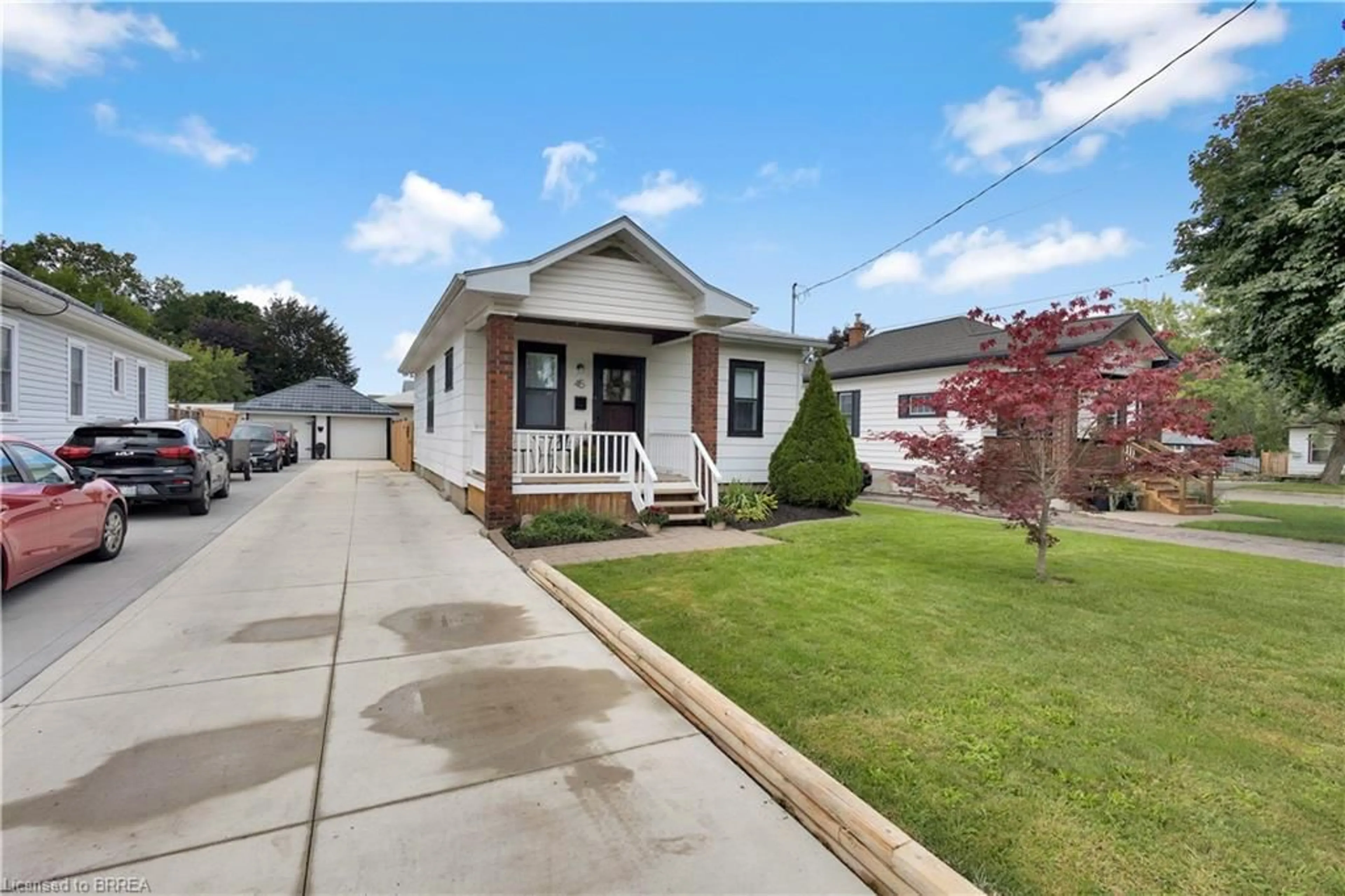 Home with vinyl exterior material, street for 45 Woodhouse St, Simcoe Ontario N3Y 1E8