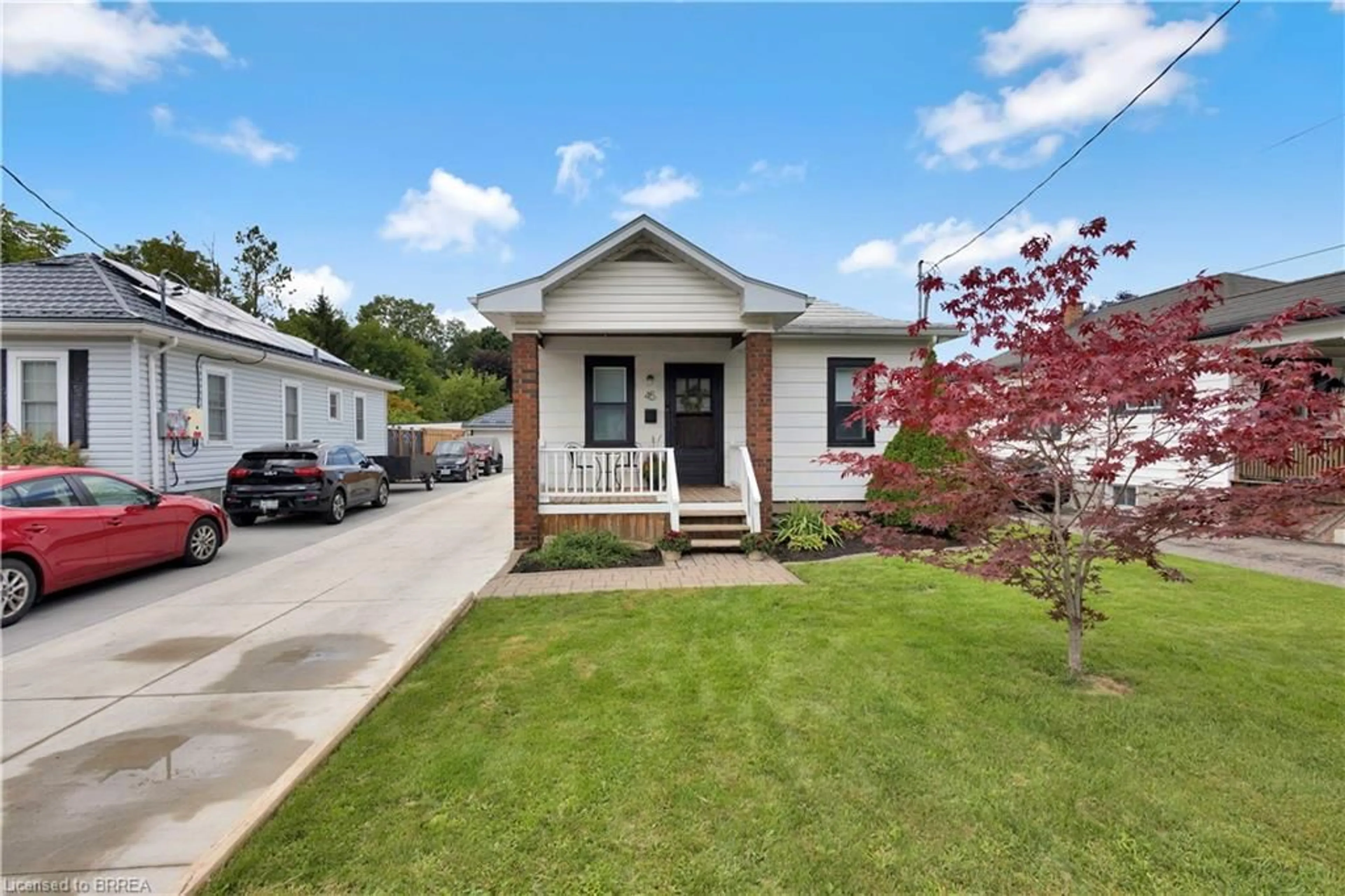 Home with vinyl exterior material, street for 45 Woodhouse St, Simcoe Ontario N3Y 1E8