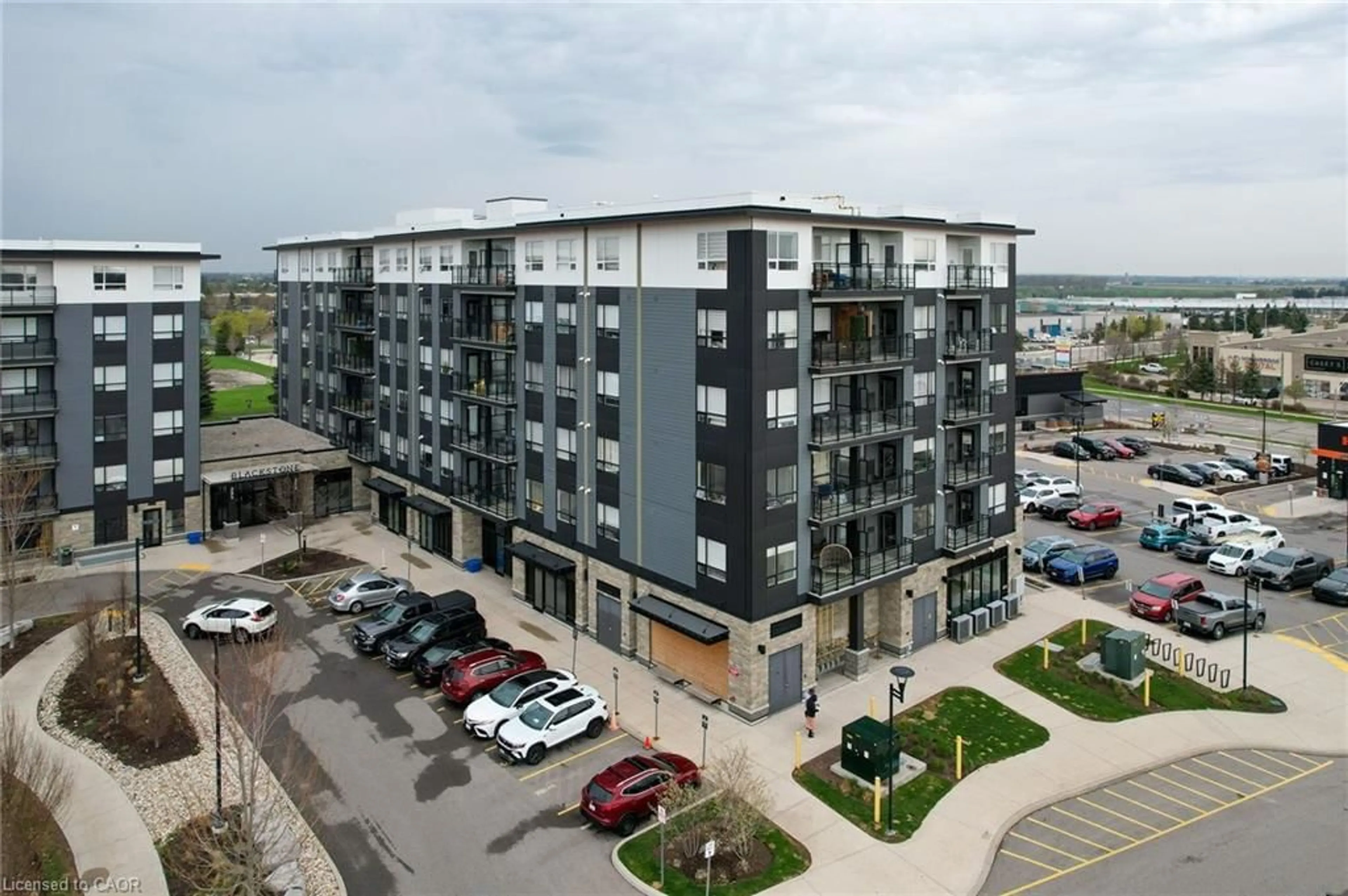 A pic from outside/outdoor area/front of a property/back of a property/a pic from drone, building for 255 Northfield Dr #202, Waterloo Ontario N2J 4G8