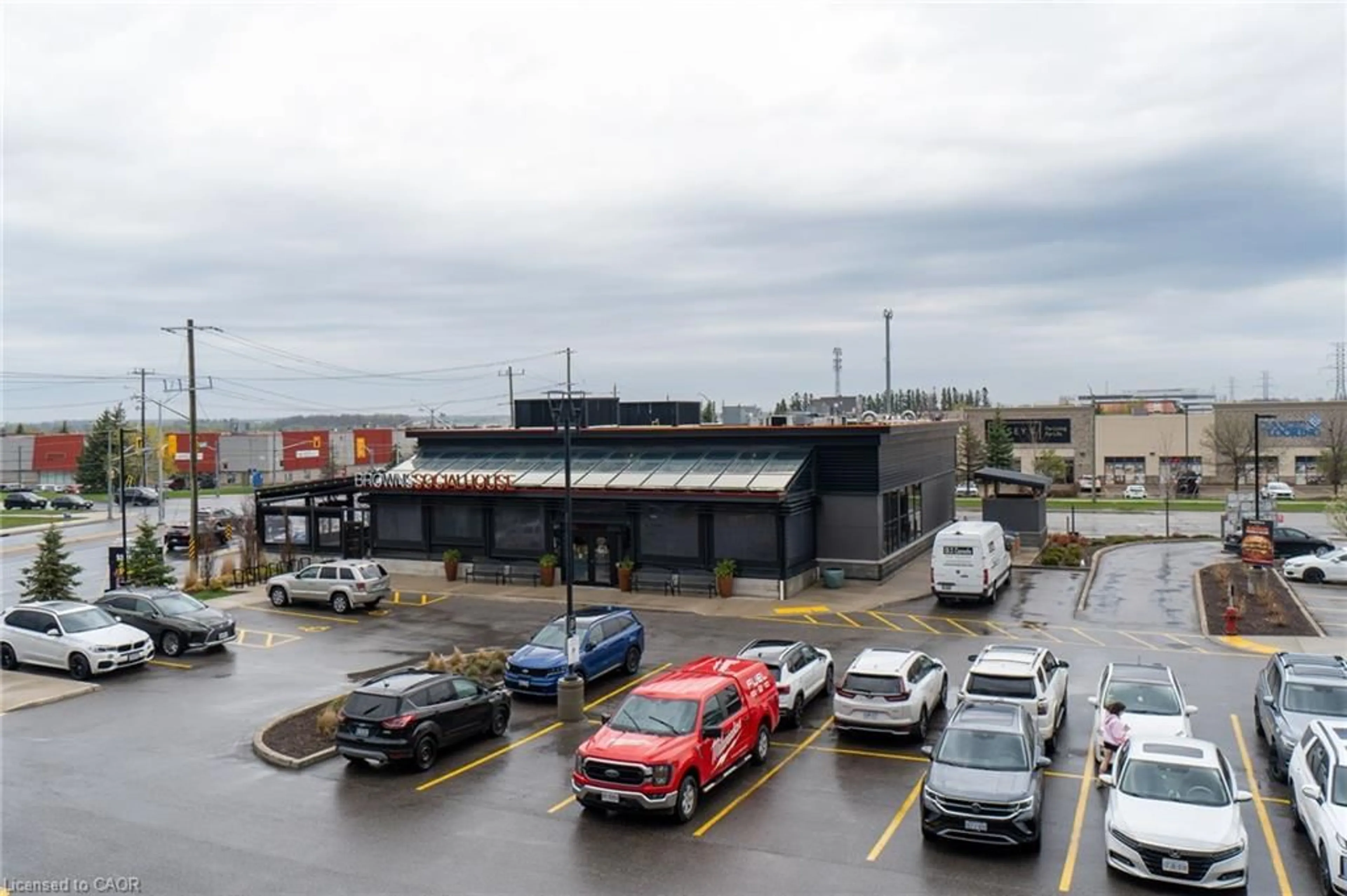 A pic from outside/outdoor area/front of a property/back of a property/a pic from drone, street for 255 Northfield Dr #202, Waterloo Ontario N2J 4G8