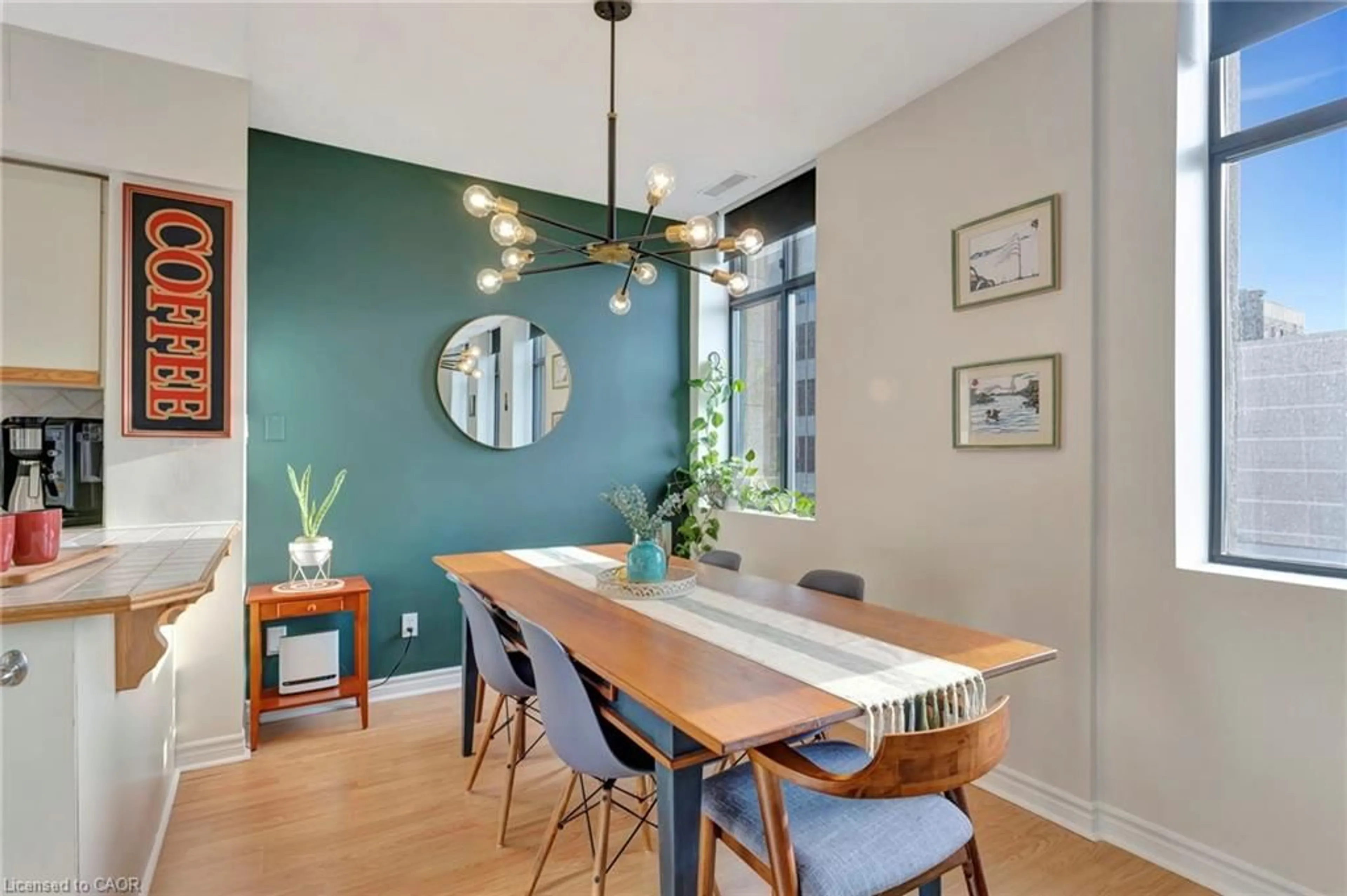 Dining room, wood/laminate floor for 36 James St #701, Hamilton Ontario L8P 4W4