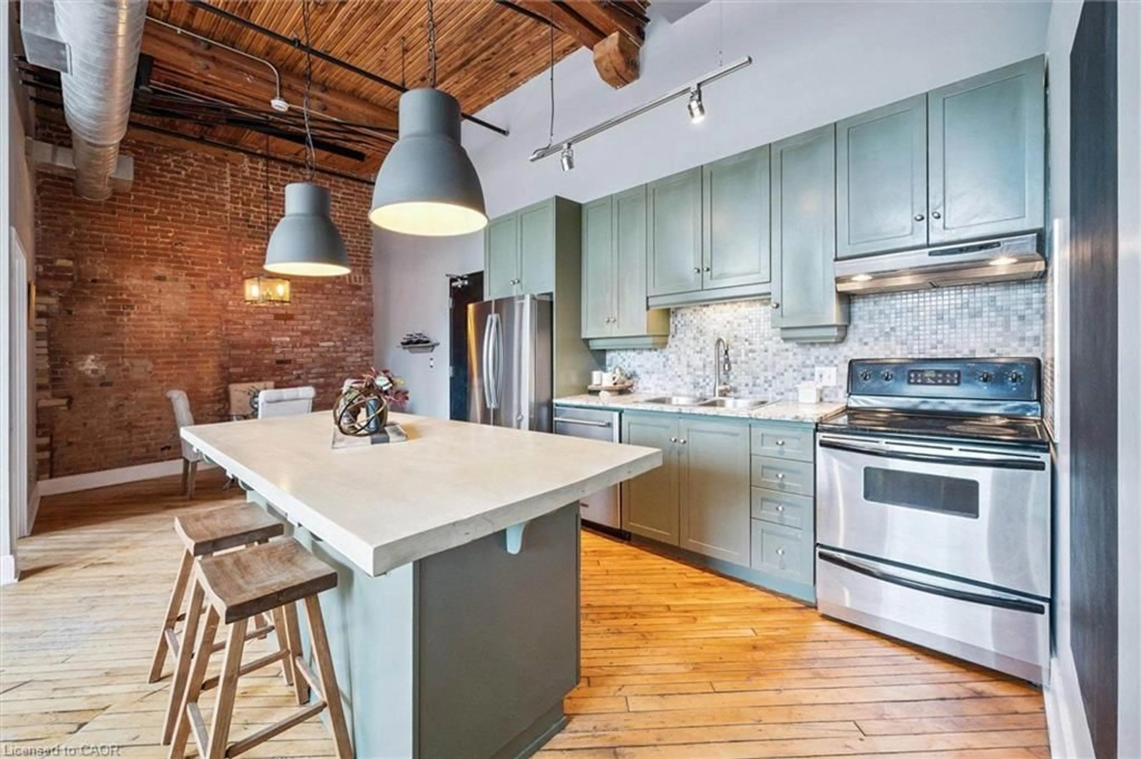 Open concept kitchen, cement floor for 26 Ontario St #122, Guelph Ontario N1E 7K1