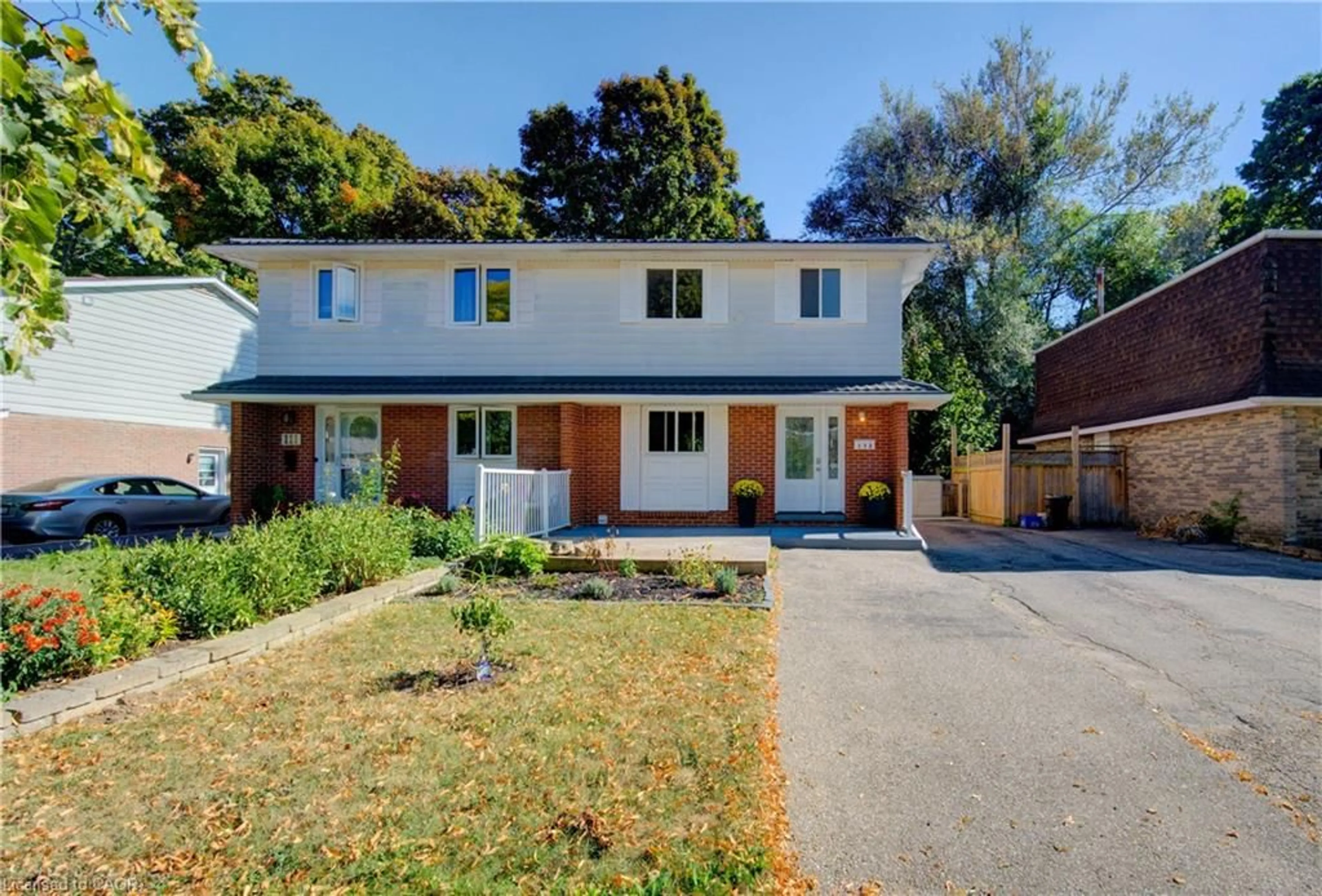 Home with brick exterior material, street for 113 Dalegrove Dr, Kitchener Ontario N2M 2G6