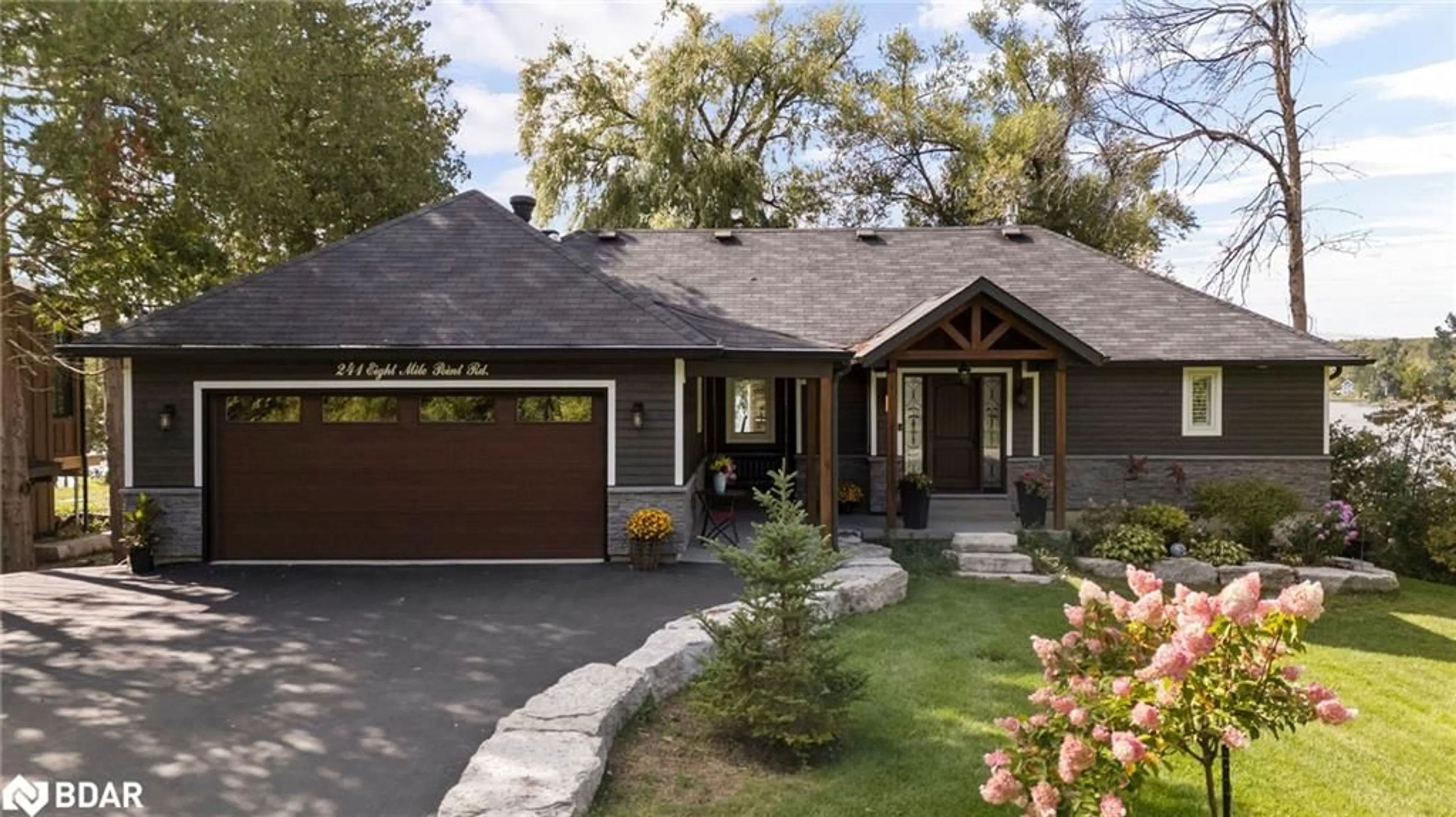 Home with vinyl exterior material, street for 241 Eight Mile Pt, Oro-Medonte Ontario L3V 6H1
