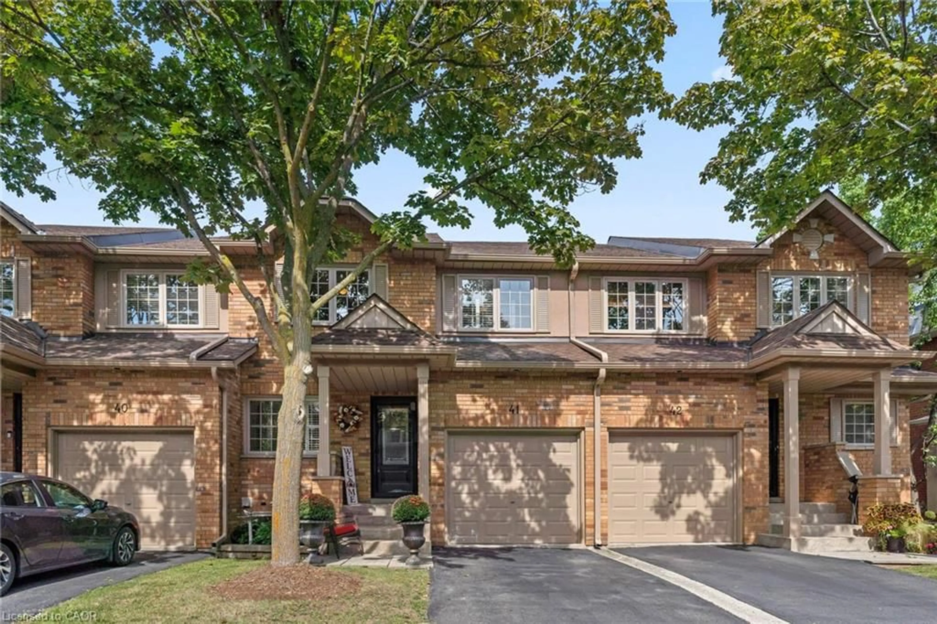 Home with brick exterior material, street for 2880 Headon Forest Dr #41, Burlington Ontario L7M 4H2