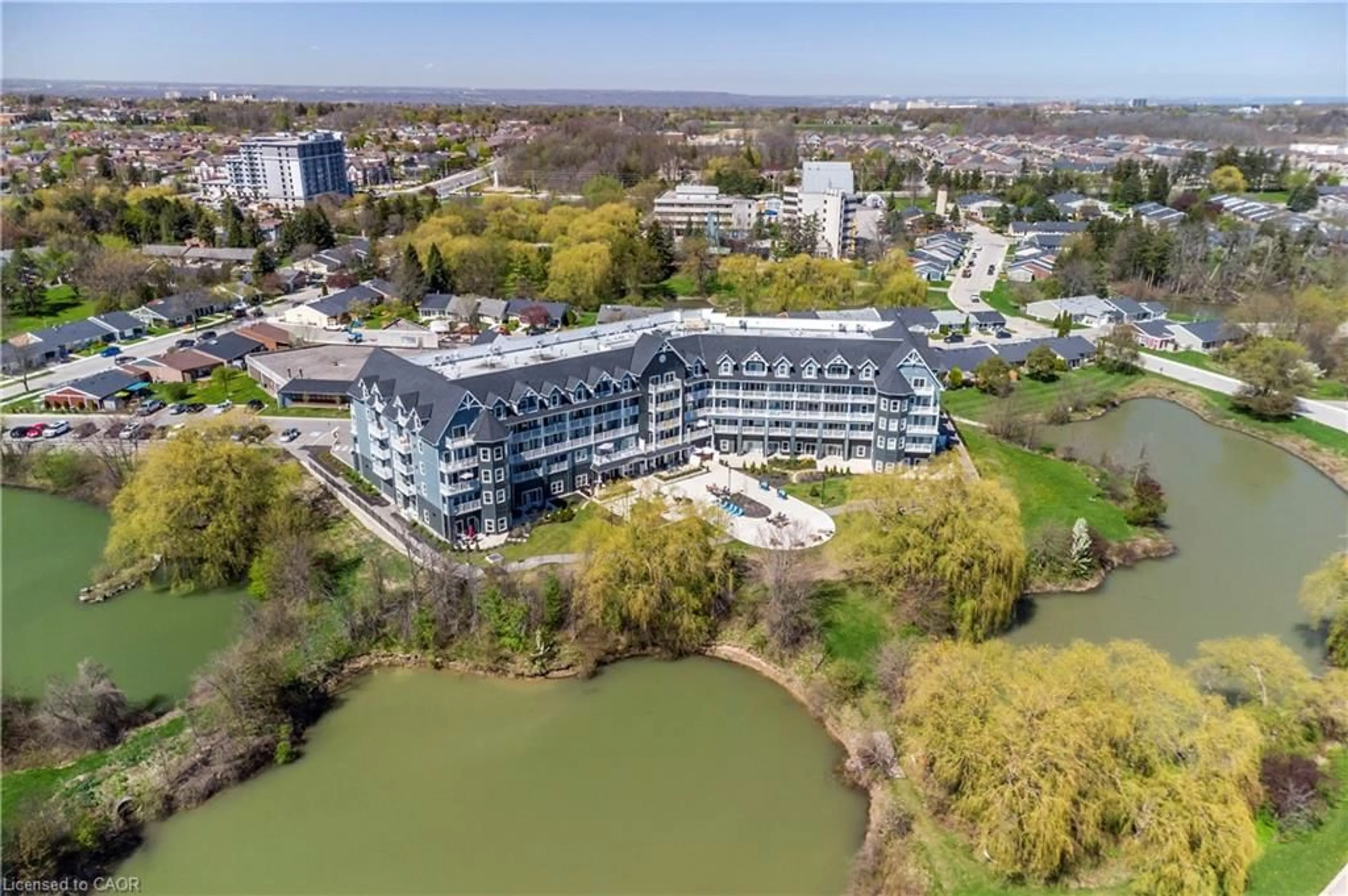 A pic from outside/outdoor area/front of a property/back of a property/a pic from drone, water/lake/river/ocean view for 39 Sister Varga Terr #213, Hamilton Ontario L9B 0J7