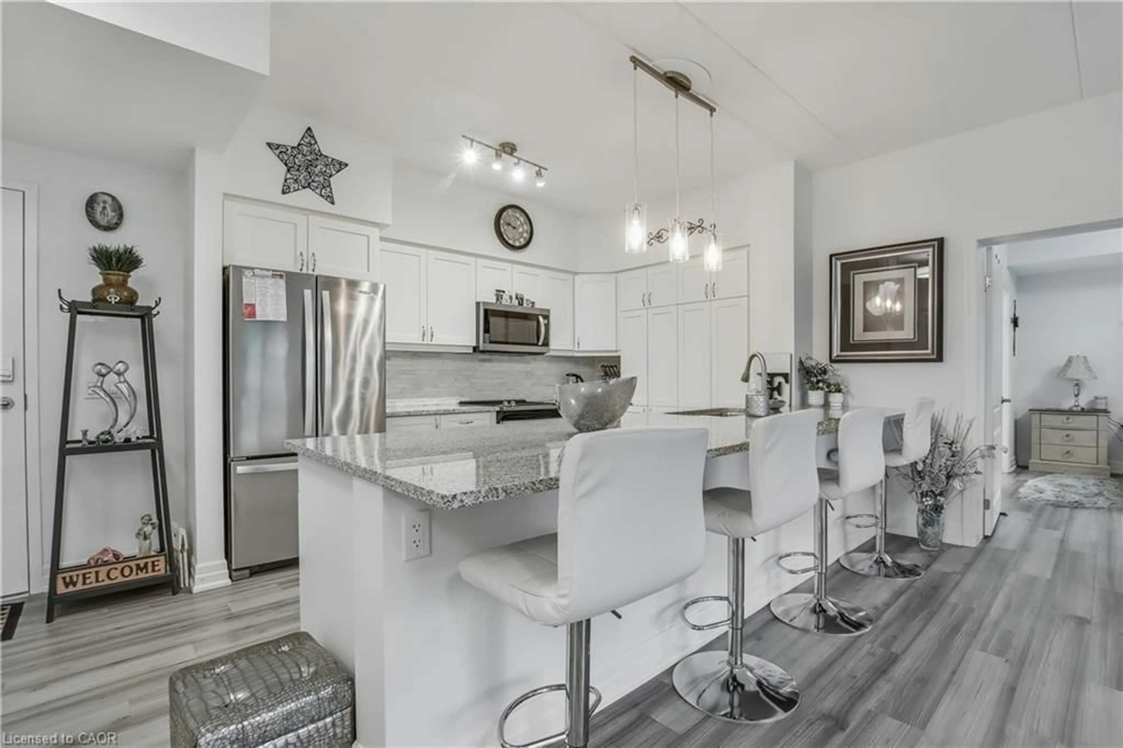 Open concept kitchen, ceramic/tile floor for 39 Sister Varga Terr #213, Hamilton Ontario L9B 0J7